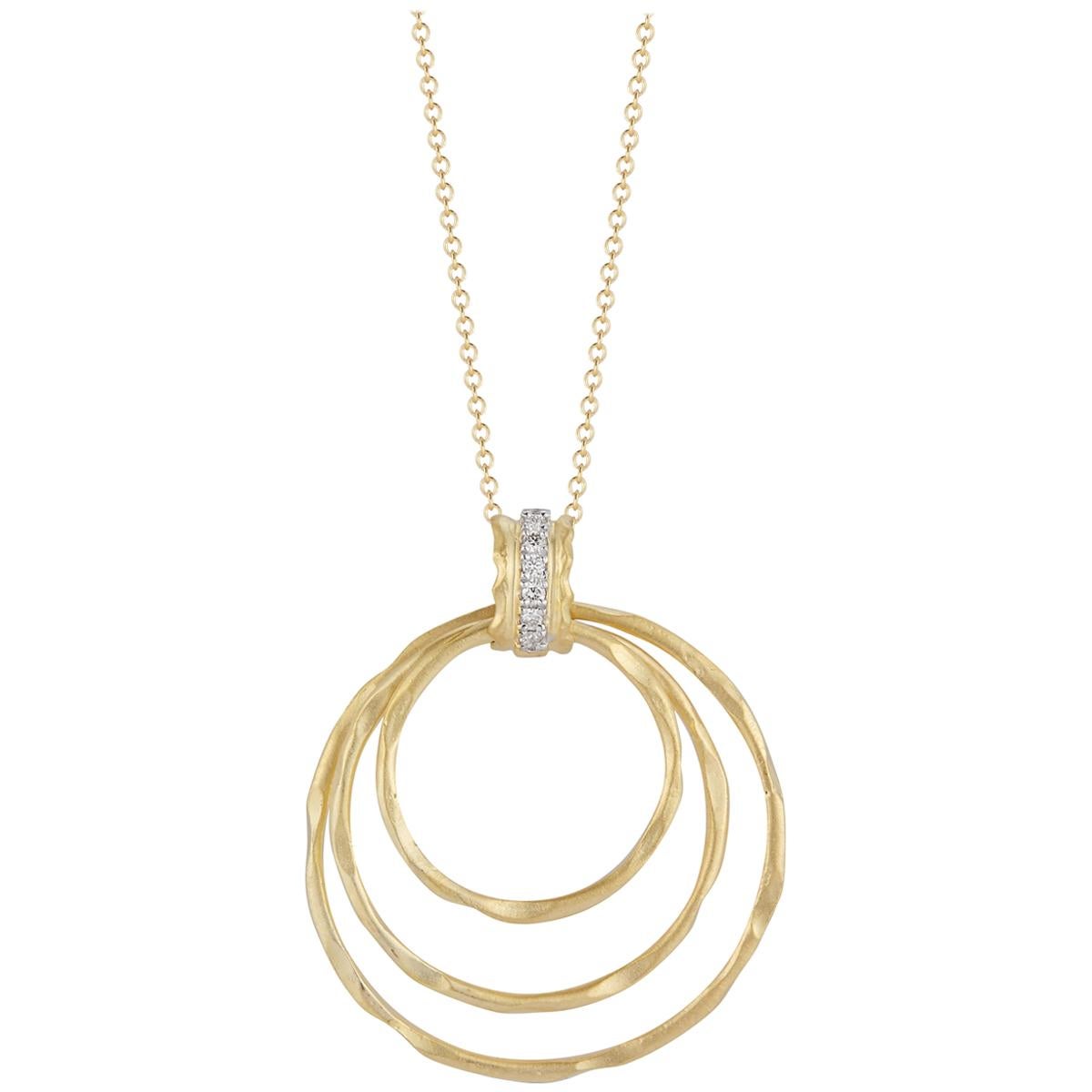 Handcrafted 14 Karat Yellow Gold Cascading Circles Pendant For Sale