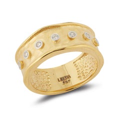 Handcrafted 14 Karat Yellow Gold Hammered Narrow Rings with Bezel Diamonds