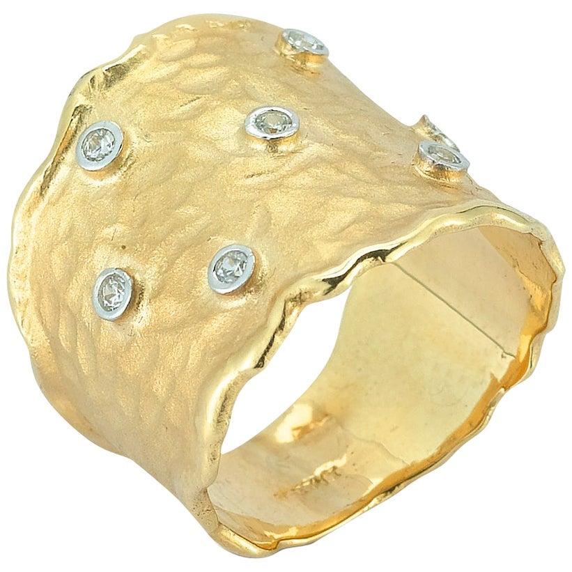 For Sale:  Handcrafted 14 Karat Yellow Gold Hammered Scattered Diamond Cigar Ring