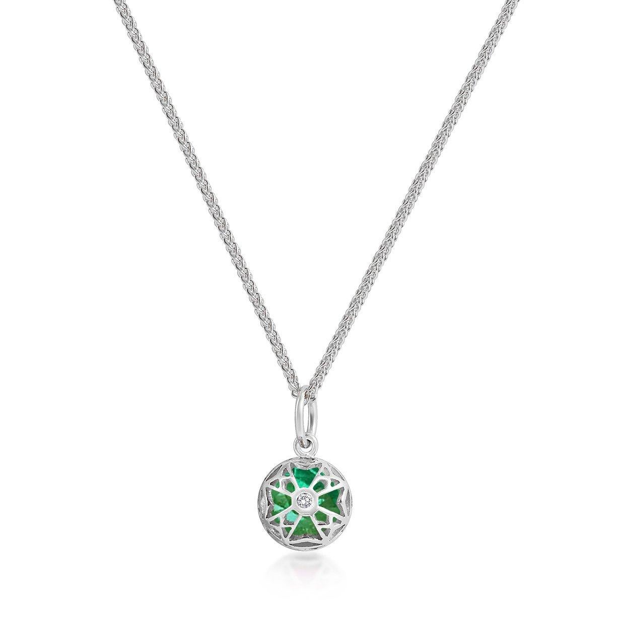 Handcrafted 1.00 Carat Emerald 18 Karat White Gold Pendant Necklace. The 7mm natural stone is set in our iconic hand pierced gold lace to let the light through. Our pendants are the ideal gift. 

Here presented on our finely knitted gold chains.