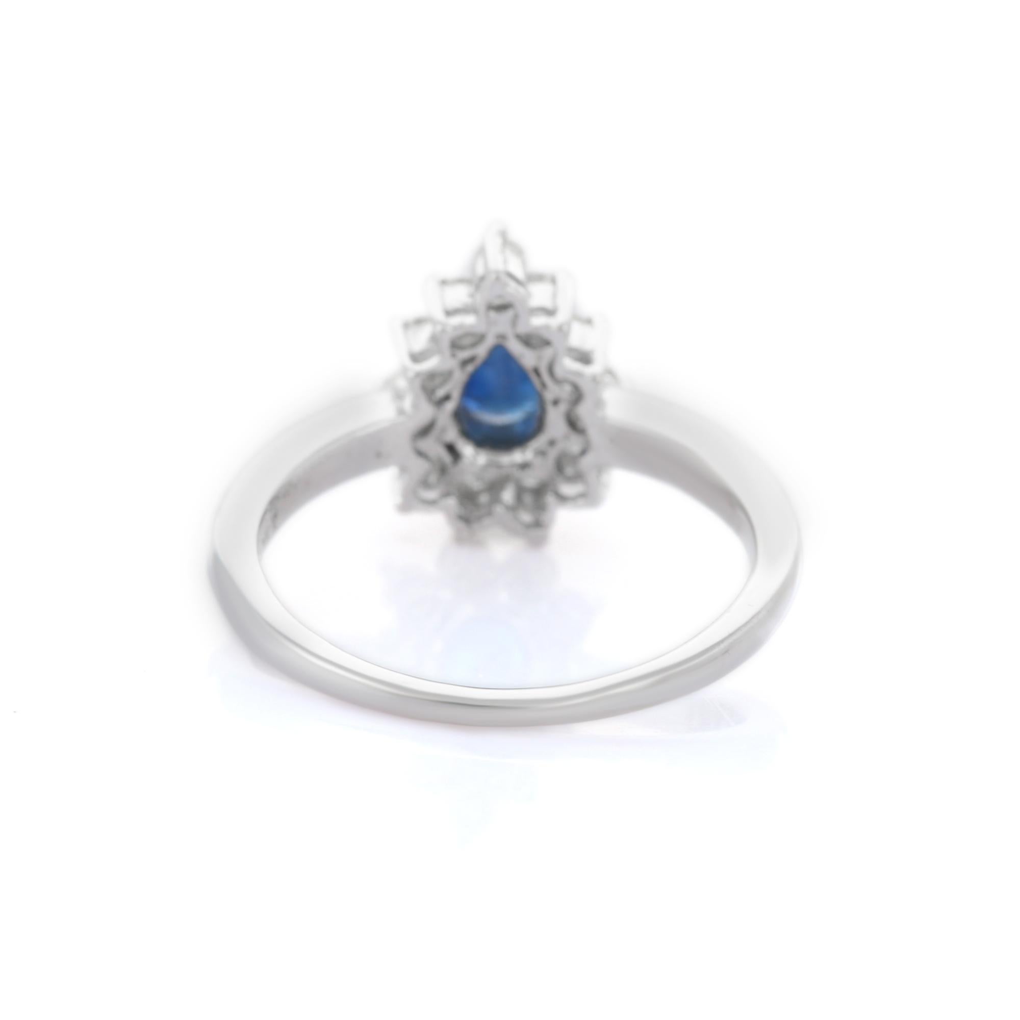 For Sale:  Handcrafted 14K White Gold Pear Cut Blue Sapphire and Halo Diamond Ring 4