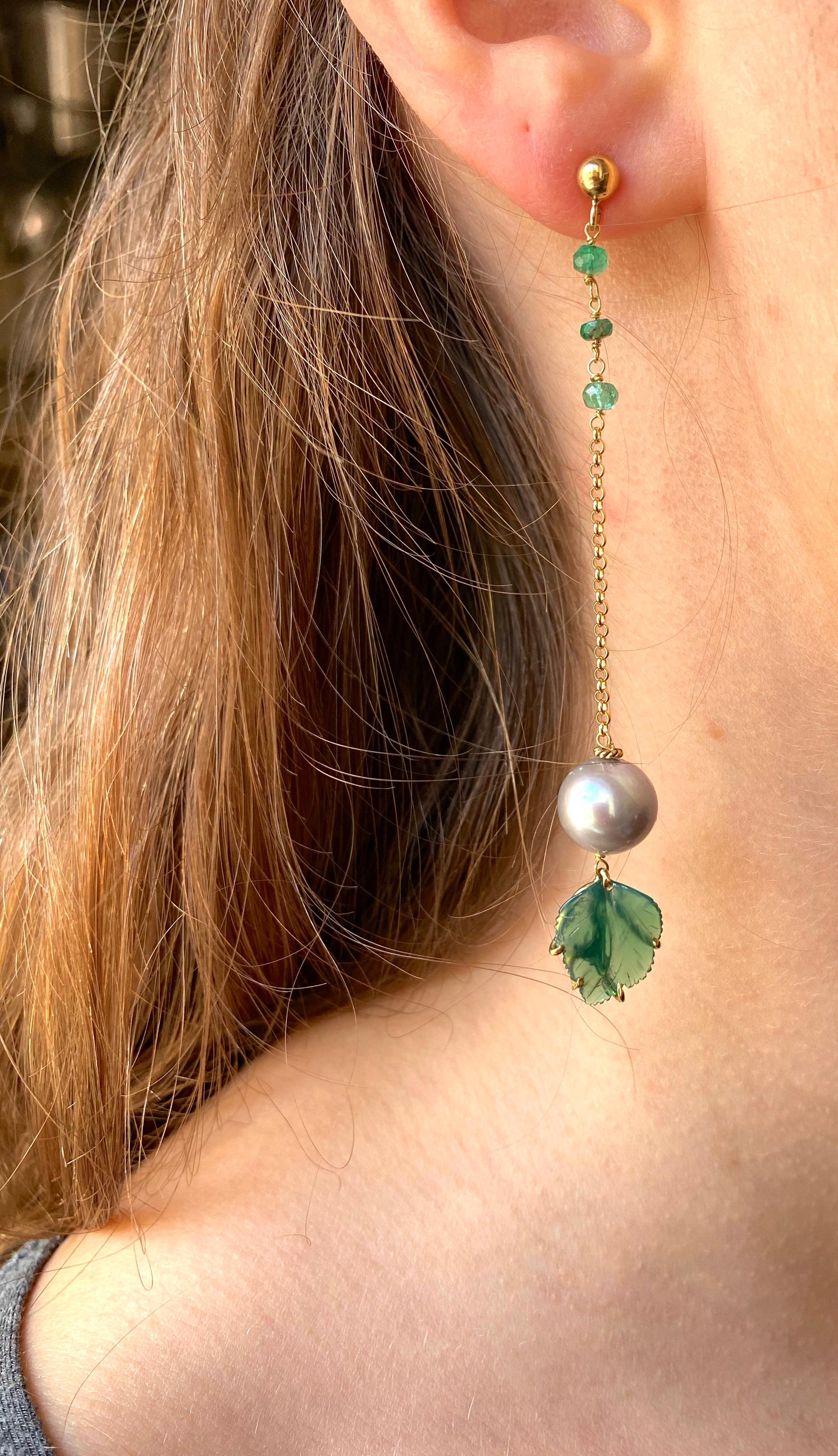 Available Now. Rossella Ugolini Design Collection,  Handcrafted earrings in 18 Karat Yellow Gold 0.12 Karat Emerald beads and Green Agate leaves and grey pearls. 
The verdant splendor of nature finds its way into these magnificent earrings, crafted