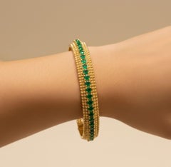 Handcrafted 18 Karat Yellow Gold Beaded Bangle with 6.75ct Natural Emeralds