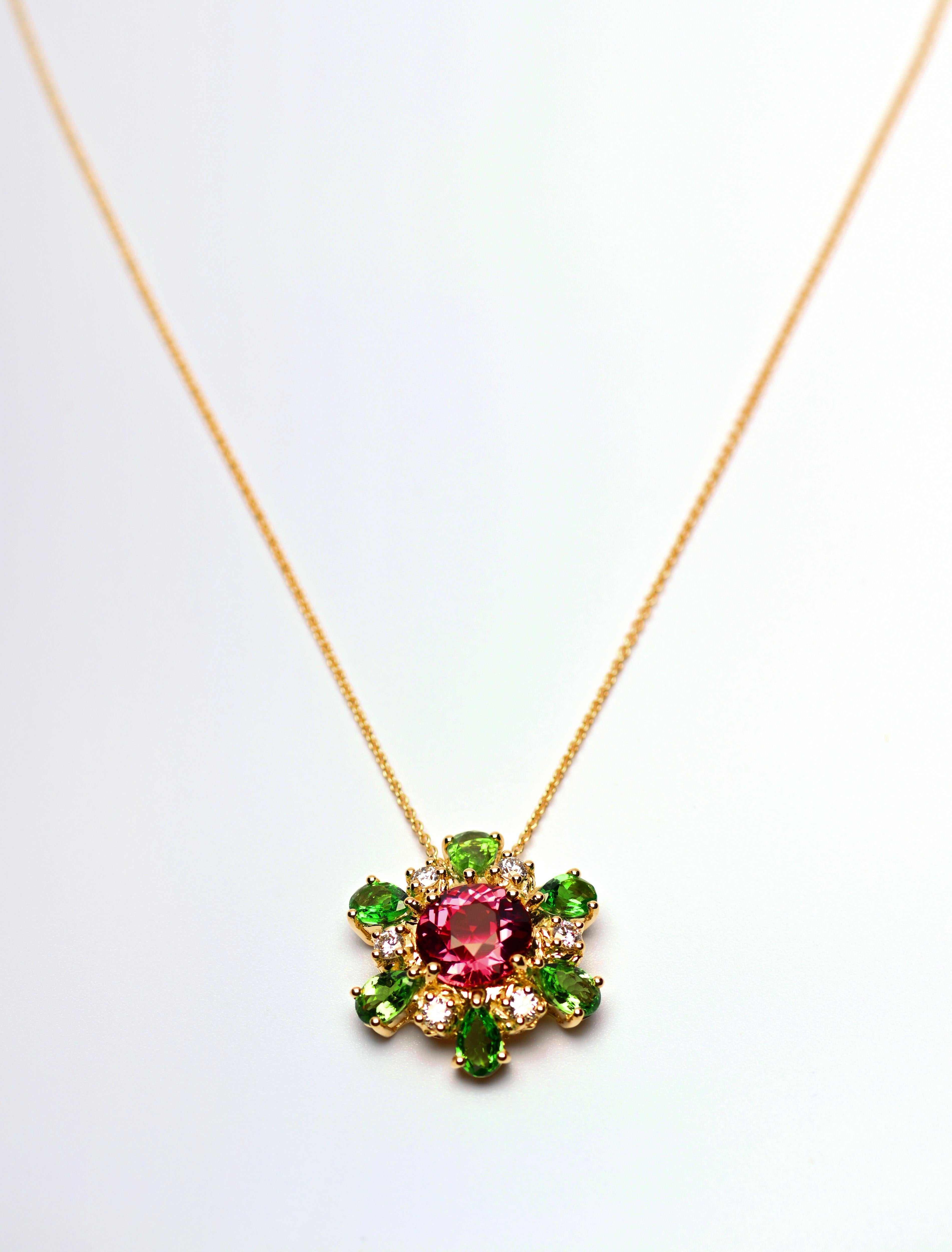 Beloved. Beautiful. Brilliant.

Maribelle is pure joy in pendant form—handcrafted in 18k yellow gold with a vibrant pink tourmaline at its heart, encircled by lush green tsavorites and a brilliant white diamond. It’s a flower in full bloom,