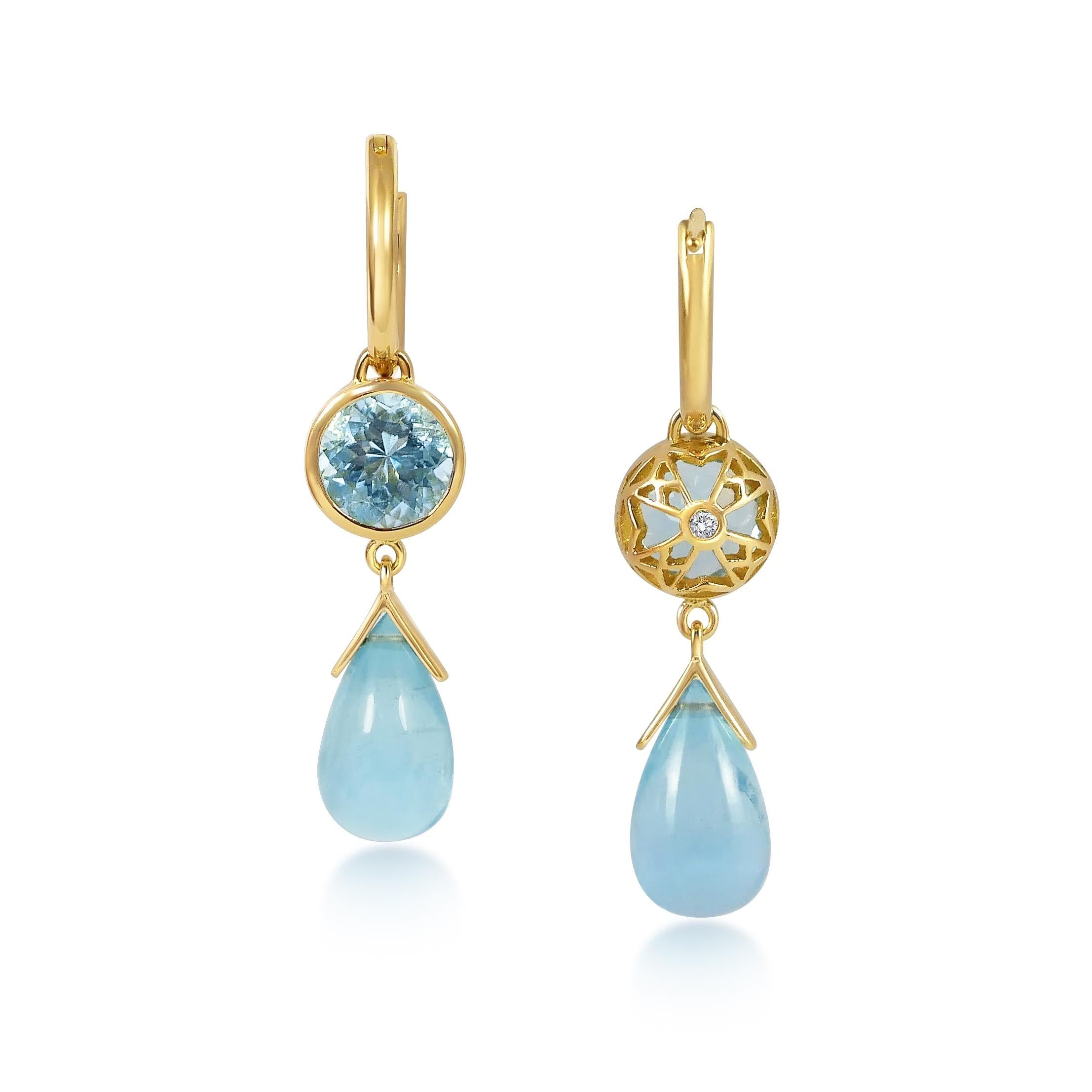 Handcrafted 2.70 & 4.40 Carats Aquamarines 3,55 Grams 18 Karat Yellow Gold Drop Earrings. Dancing drops carved in Aquamarine under a set of 8mm round cut Aquamarine stones encased in our iconic hand pierced gold lace to let the light through. A