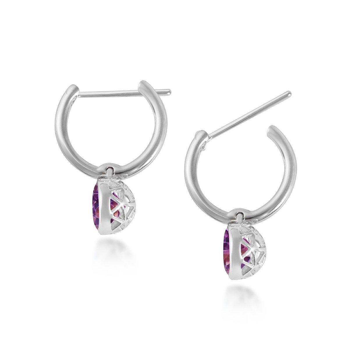 Handcrafted 2.40 Carats Amethyst 18 Karat White Gold Drop Earrings. The 8mm natural stones are set in our iconic hand pierced gold lace to let the light through. Our precious and fine stones on our dangling earrings are highlighted by a diamond on