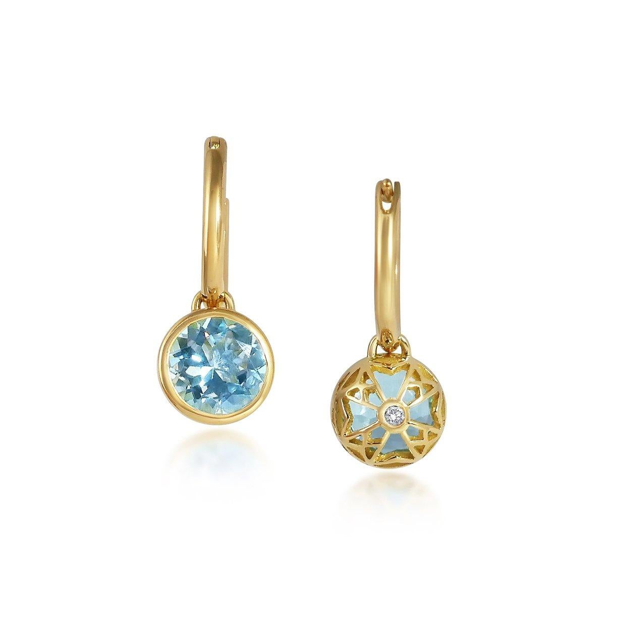 Handcrafted 2.70 Carats Aquamarine 18 Karat Yellow Gold Drop Earrings. The 8mm natural stones are set in our iconic hand pierced gold lace to let the light through. Our precious and fine stones on our dangling earrings are highlighted by a diamond