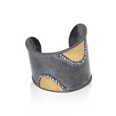 Brazalete artesanal de oro y plata de 24 quilates con diamantes