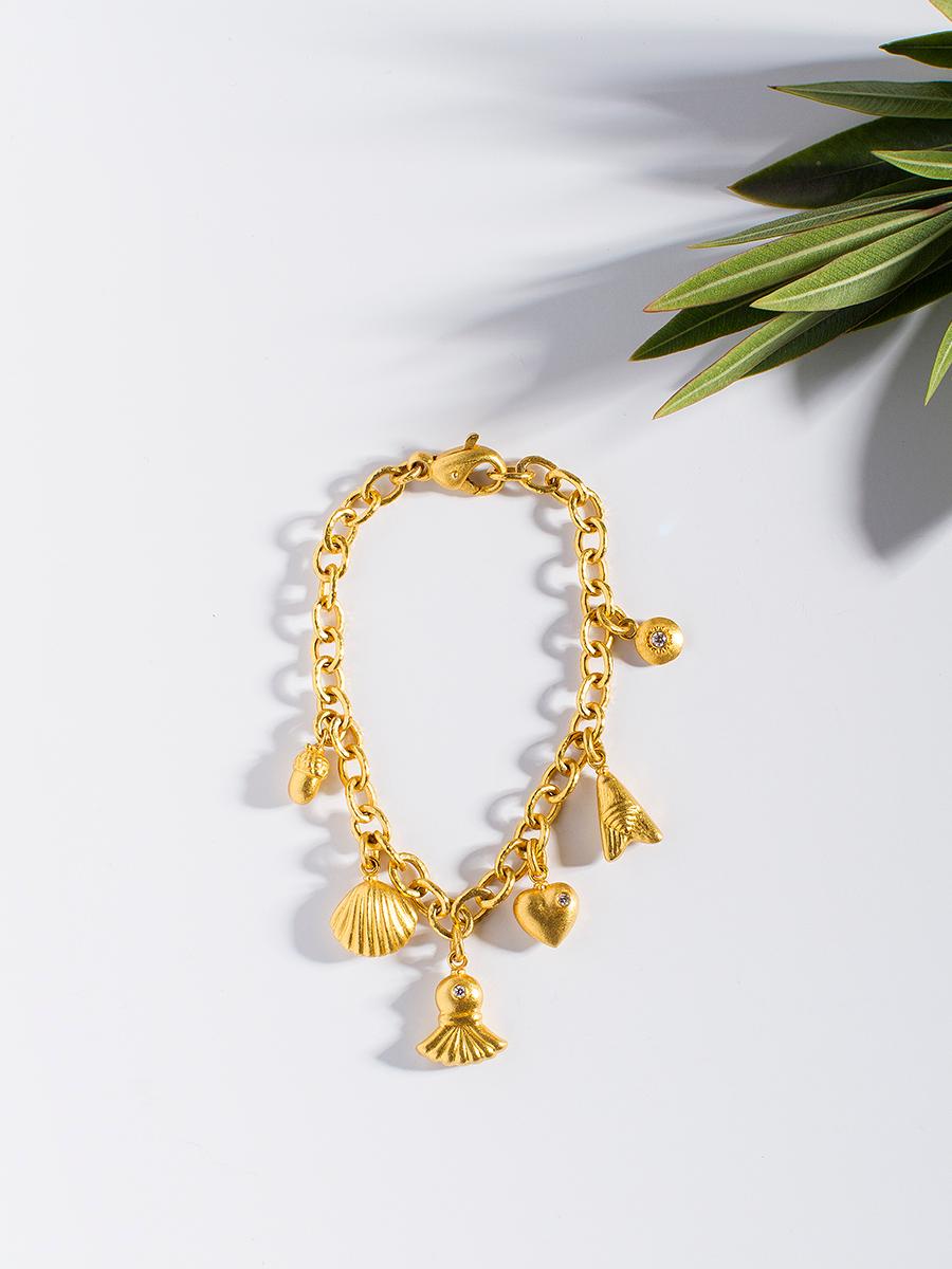 24 karat gold charm bracelet