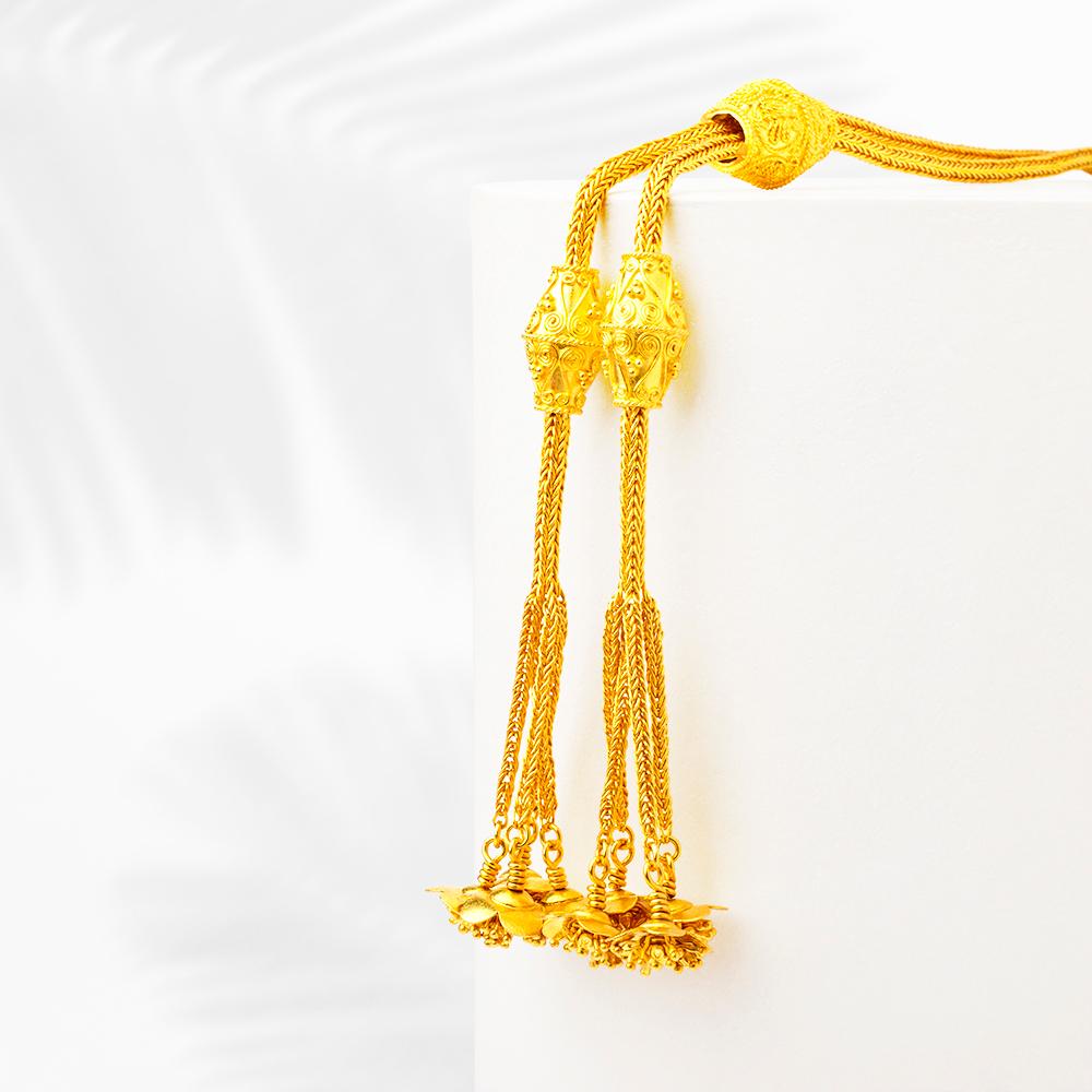 Handcrafted 24K Gold Tassle Necklace with Flower Patterns

Gold Weight : 73.56 Grams