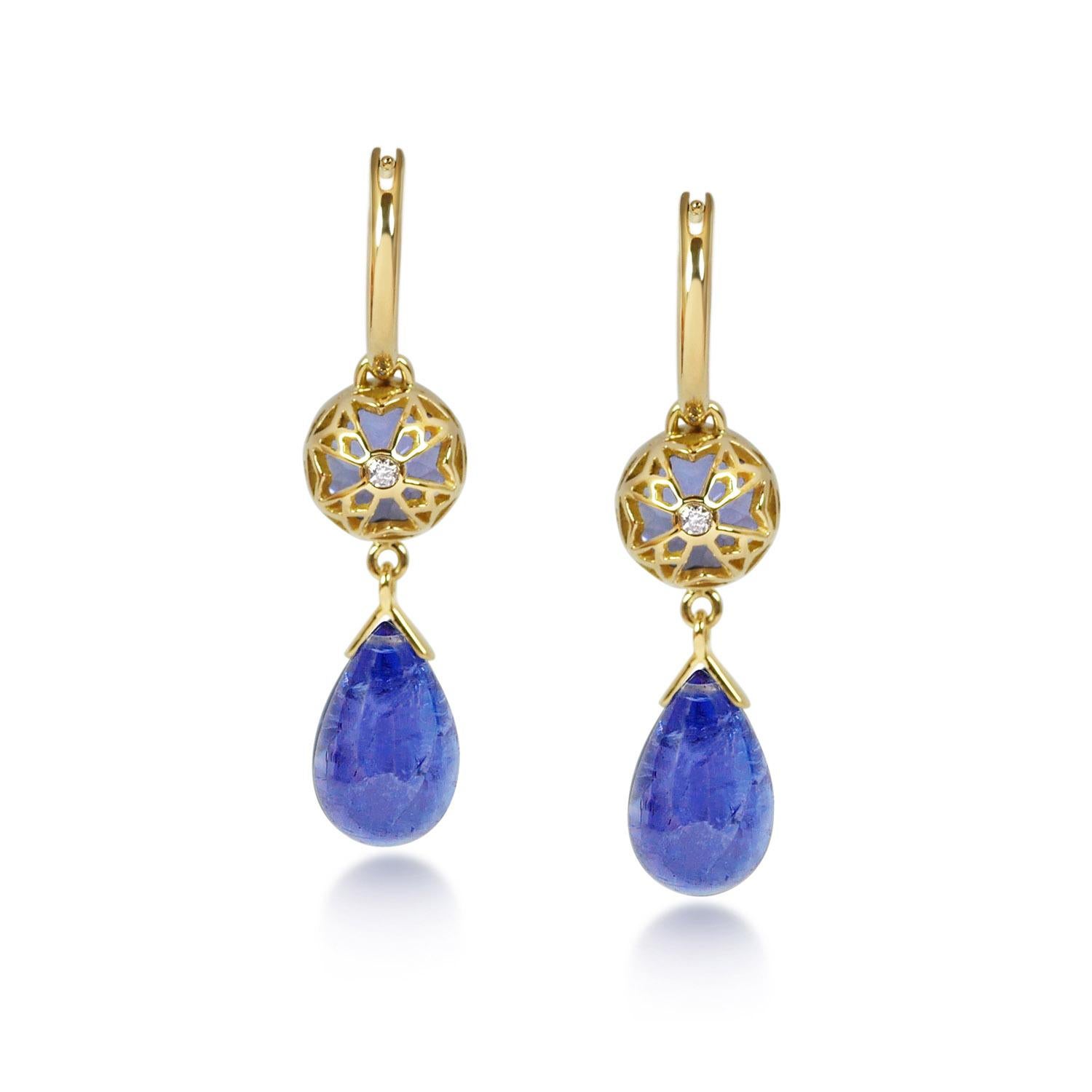 Handcrafted 2.80 & 10.95 Carats Tanzanites 18 Karat Yellow Gold Drop Earrings. Dancing drops carved in Tanzanite under a set of 8mm round cut Tanzanite stones encased in our iconic hand pierced gold lace to let the light through. A diamond has been