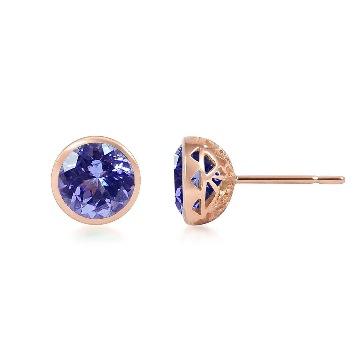 Handcrafted 2.80 Carats Tanzanite 18 Karat Rose Gold Stud Earrings. The 8mm natural stones are set in our iconic hand pierced gold lace to let the light through our precious and fine stones our earrings are the perfect everyday wear.

This unique