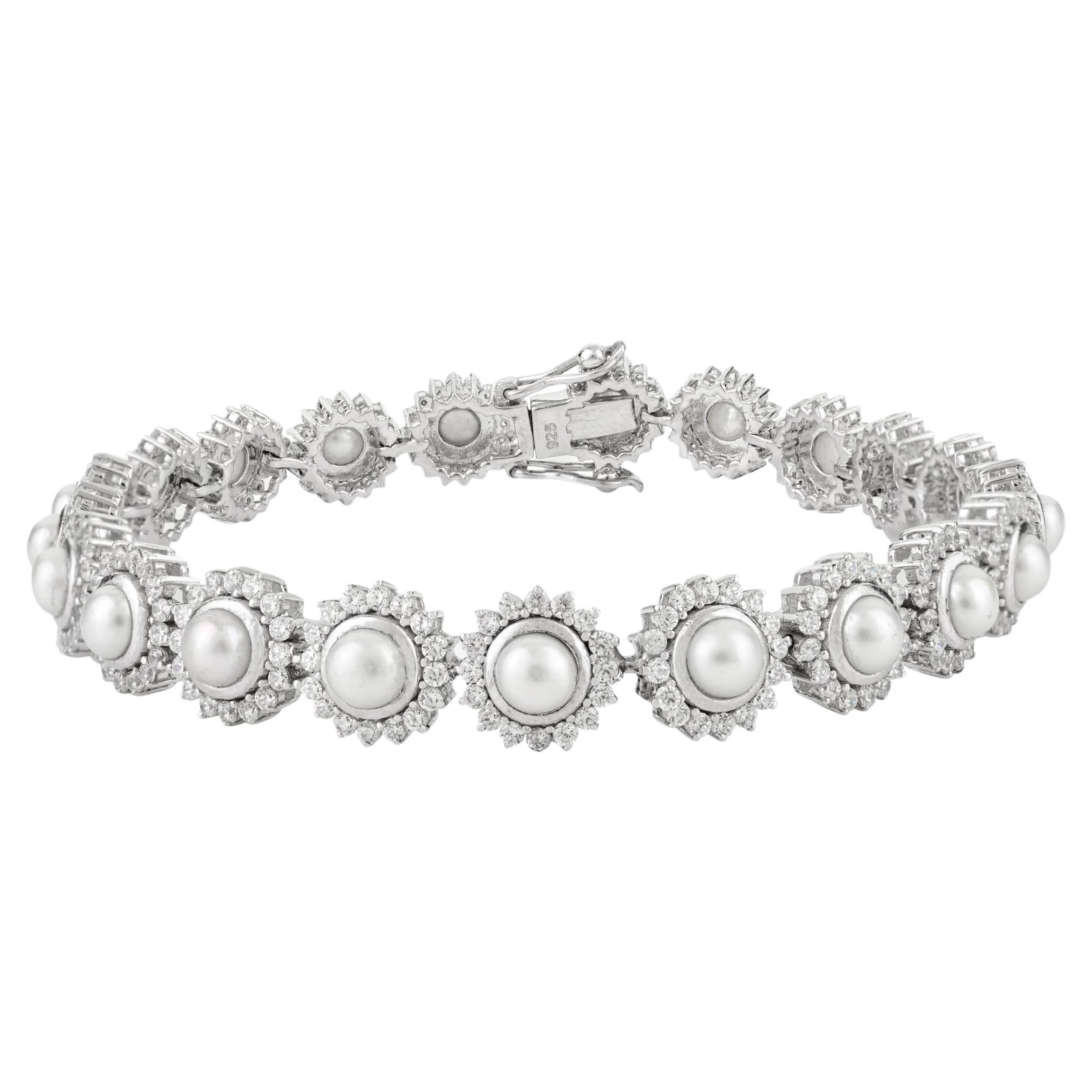 Handgefertigtes Tennisarmband aus 925er Silber mit natürlichen Perlen und Halo-Cubic-Zirkon im Angebot