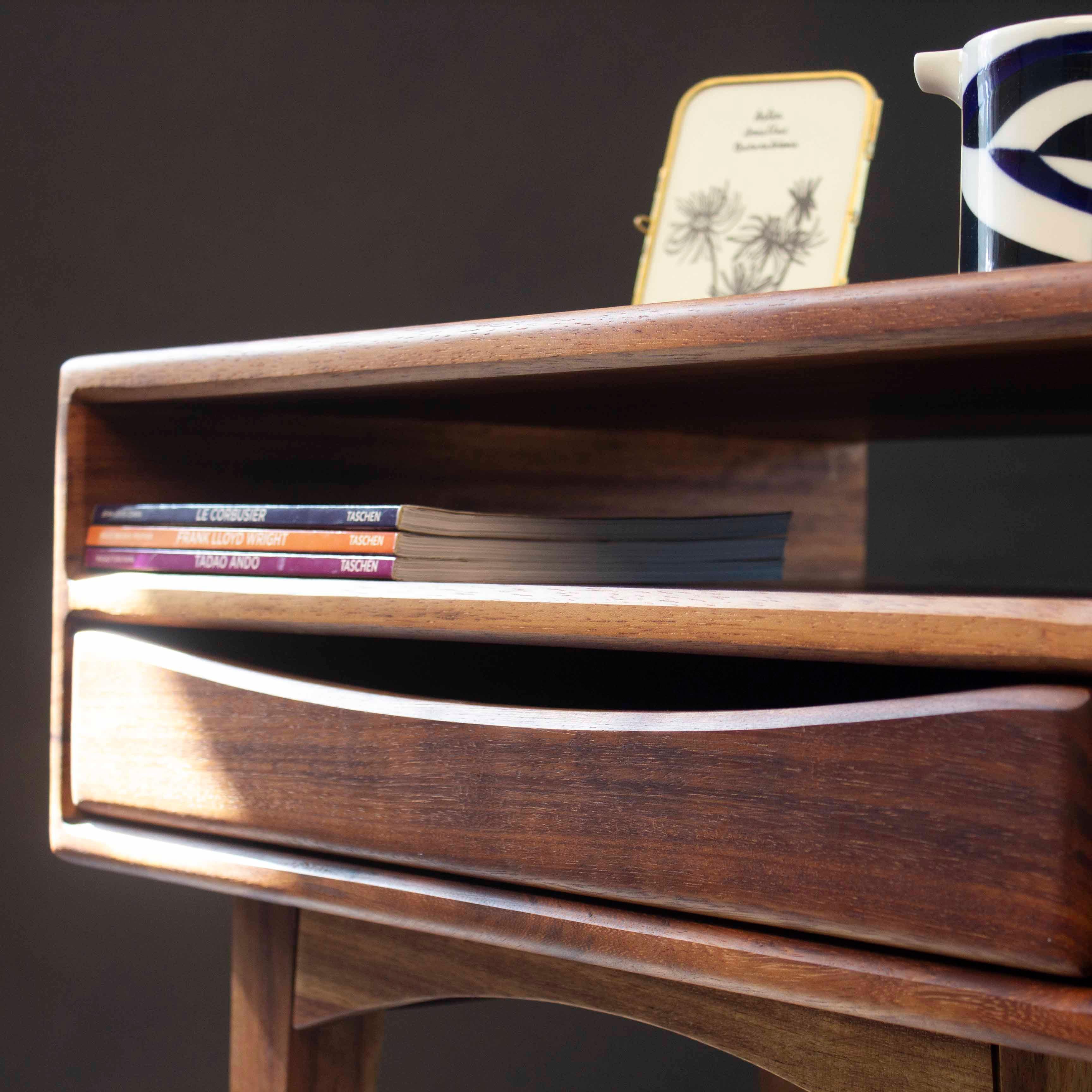 Mid-Century Modern Nightstand 
This handcrafted bedside table blends timeless mid-century modern elegance with exceptional craftsmanship, showcasing refined compass legs and a spacious single drawer. Inspired by authentic Danish and Scandinavian
