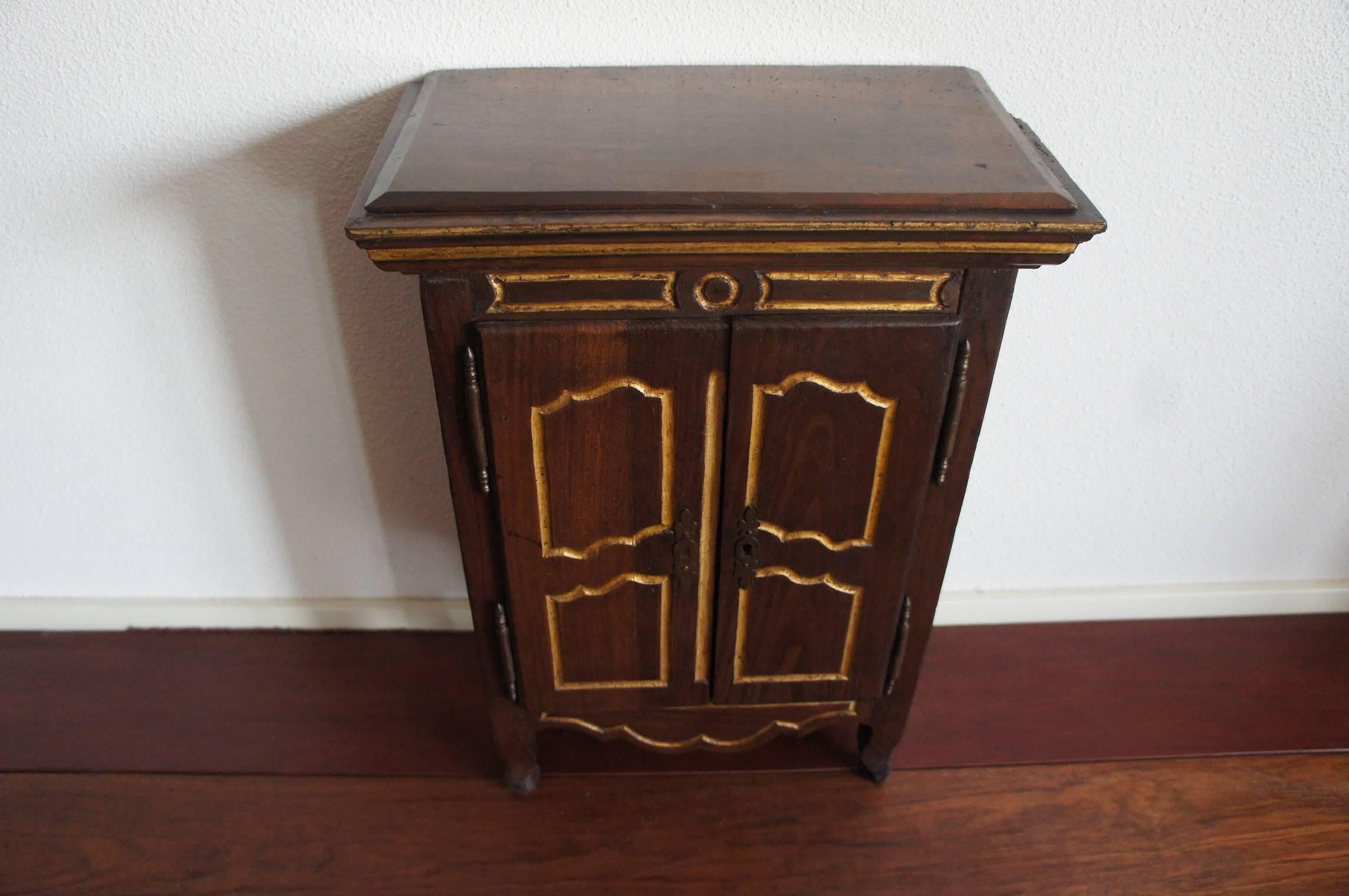 Hand-Crafted Handcrafted and Gilt Nutwood Miniature Cabinet with Silky Linen Interior