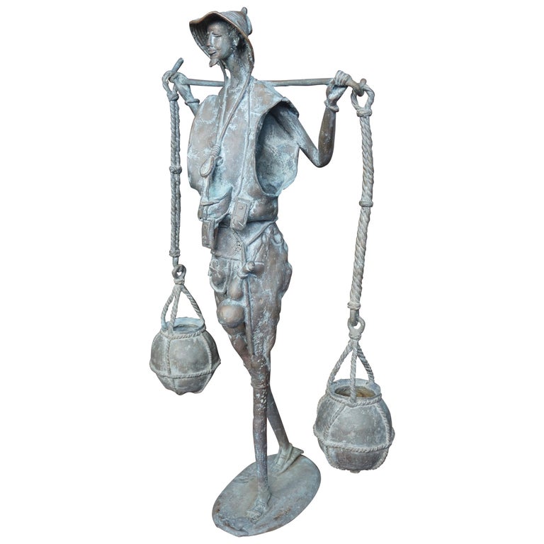 Handcrafted and Wonderful Tall African Male Water Carrier Bronze