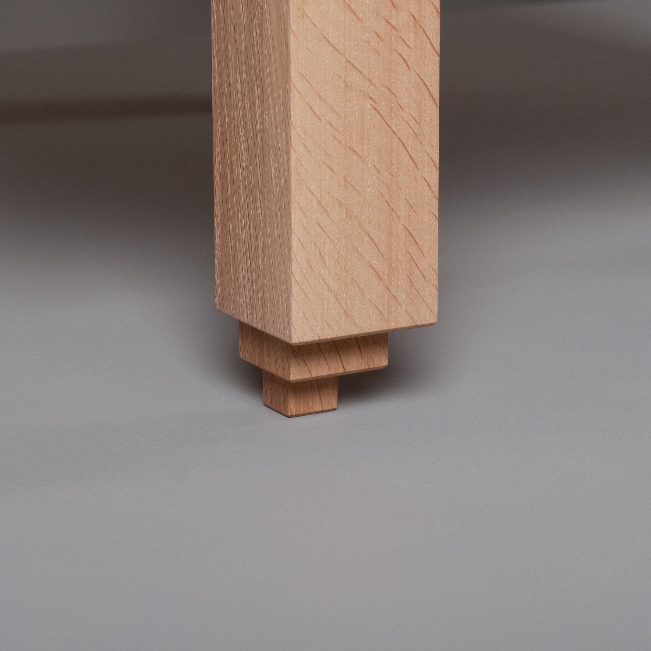 Handcrafted architectural English oak Ziggurat table. For use as end tables/nightstands -or with customised dimensions to sofa/coffee/console table.
Offset and stepped oak legs. Lower shelf. Top surface of quarter-sawn oak, pippy oak and inlaid