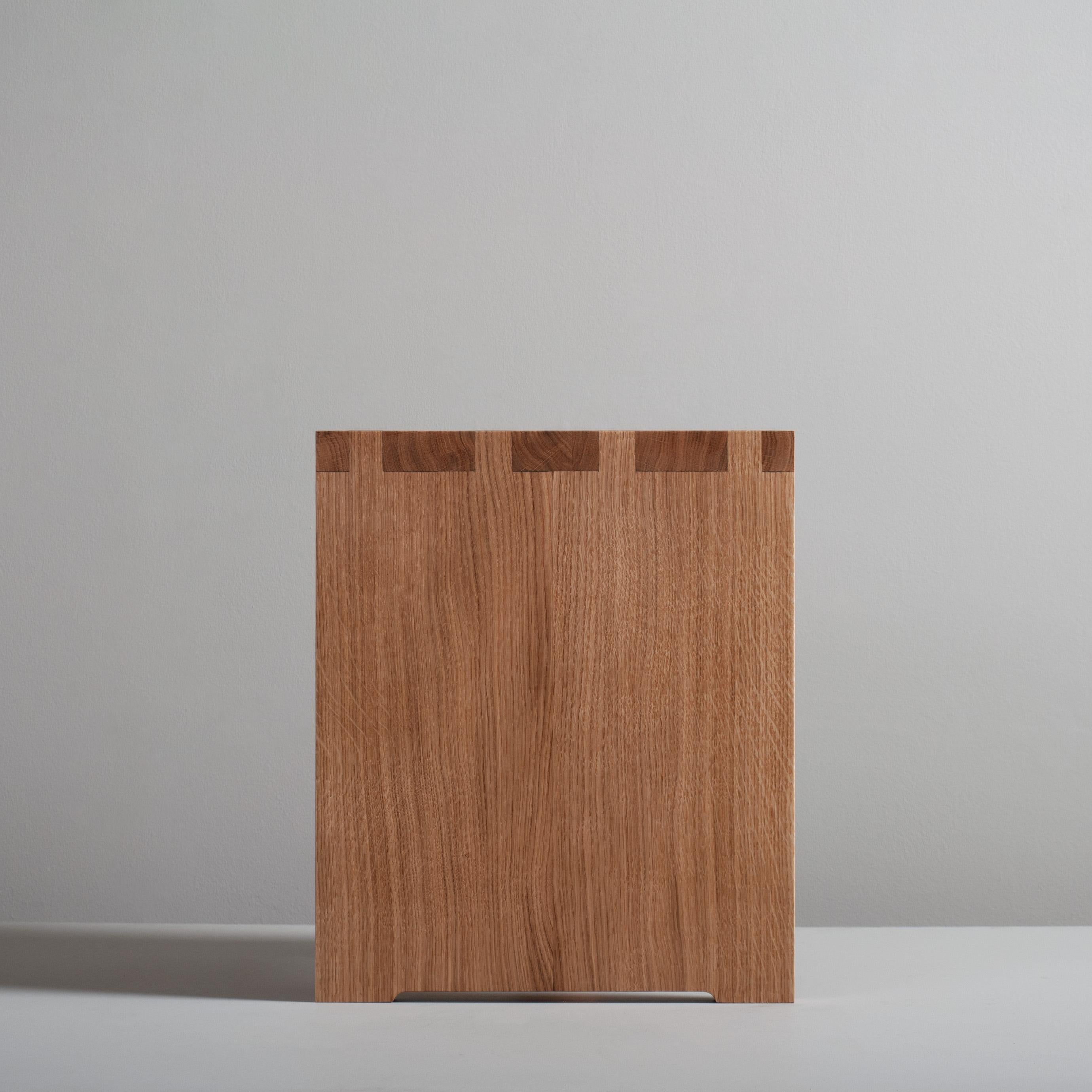 Architectural oak Pillar nightstands or end tables. Early European modernism inspired with a dash of Japanese minimalism - always focusing on the beauty of the materials. Designed by SUM furniture and handcrafted in England using traditional