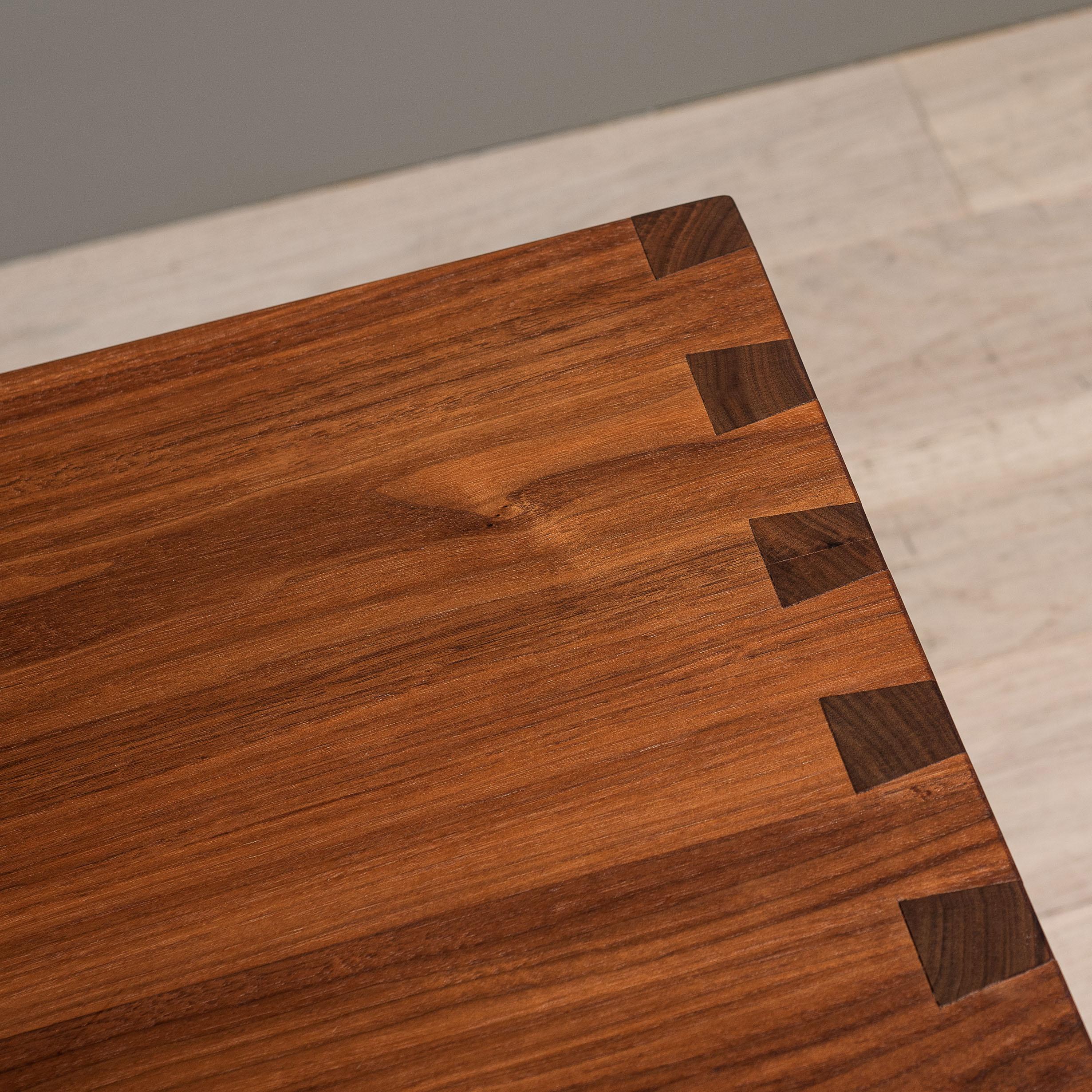 Large Architectural American black walnut pillar - sofa/coffee/center table. Designed and handcrafted in England using traditional techniques using the finest American black walnut. Hand-cut large dovetail jointing with turned walnut upright pillar