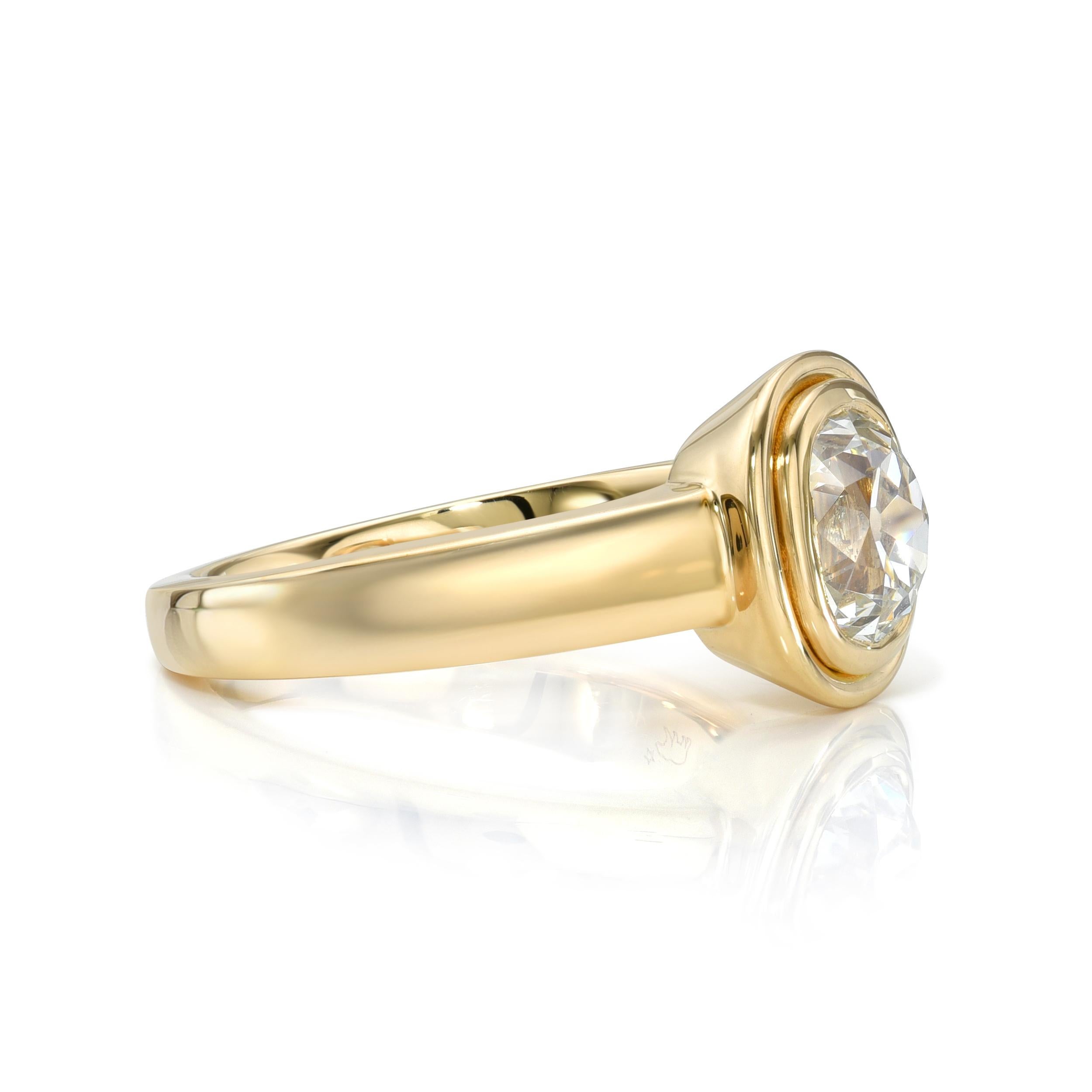 1.74ct L/SI1 GIA certified antique cushion cut diamond bezel set in a handcrafted 18K yellow gold mounting.
