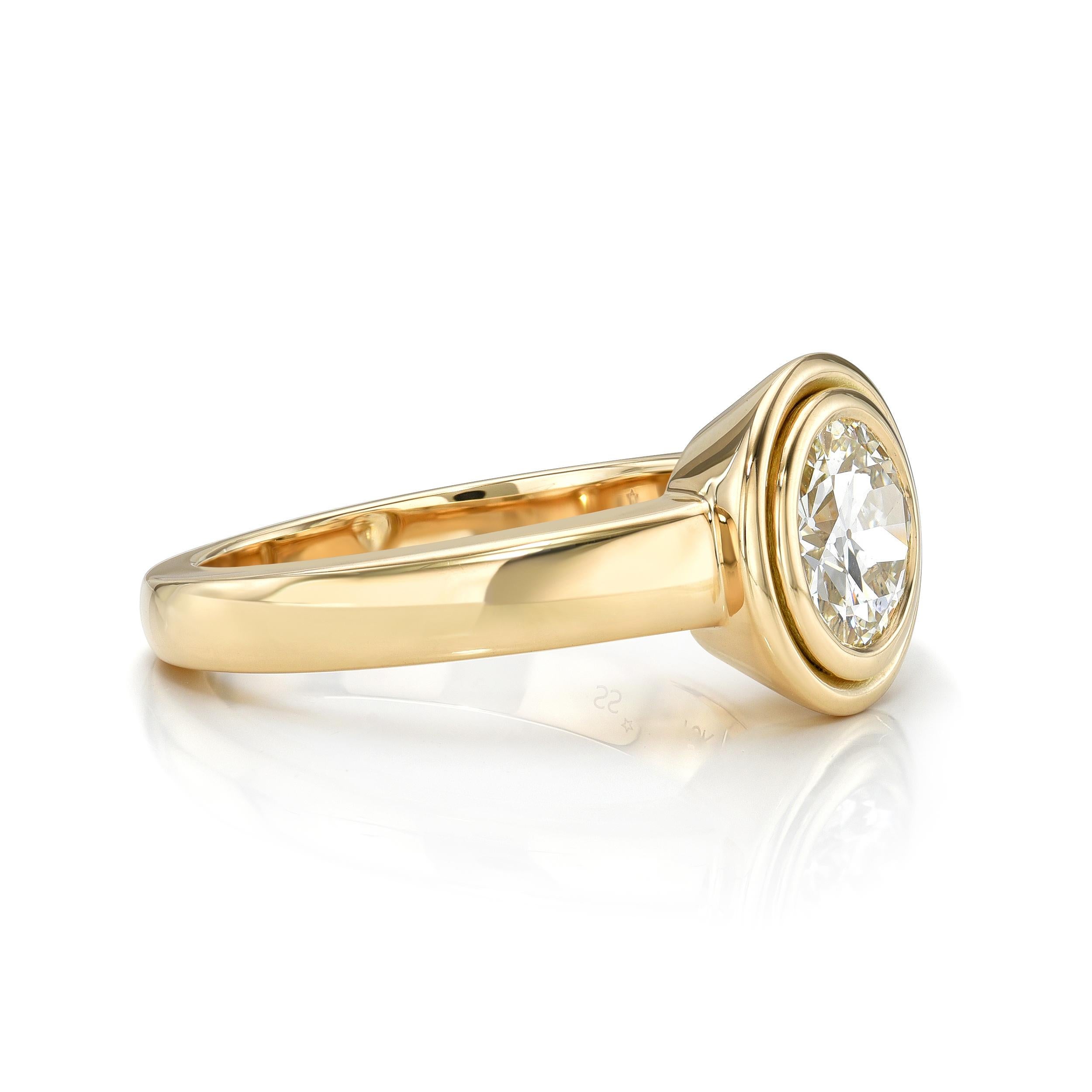 1.12ct K/SI1 GIA certified old European cut diamond bezel set in a handcrafted 18K yellow gold mounting.