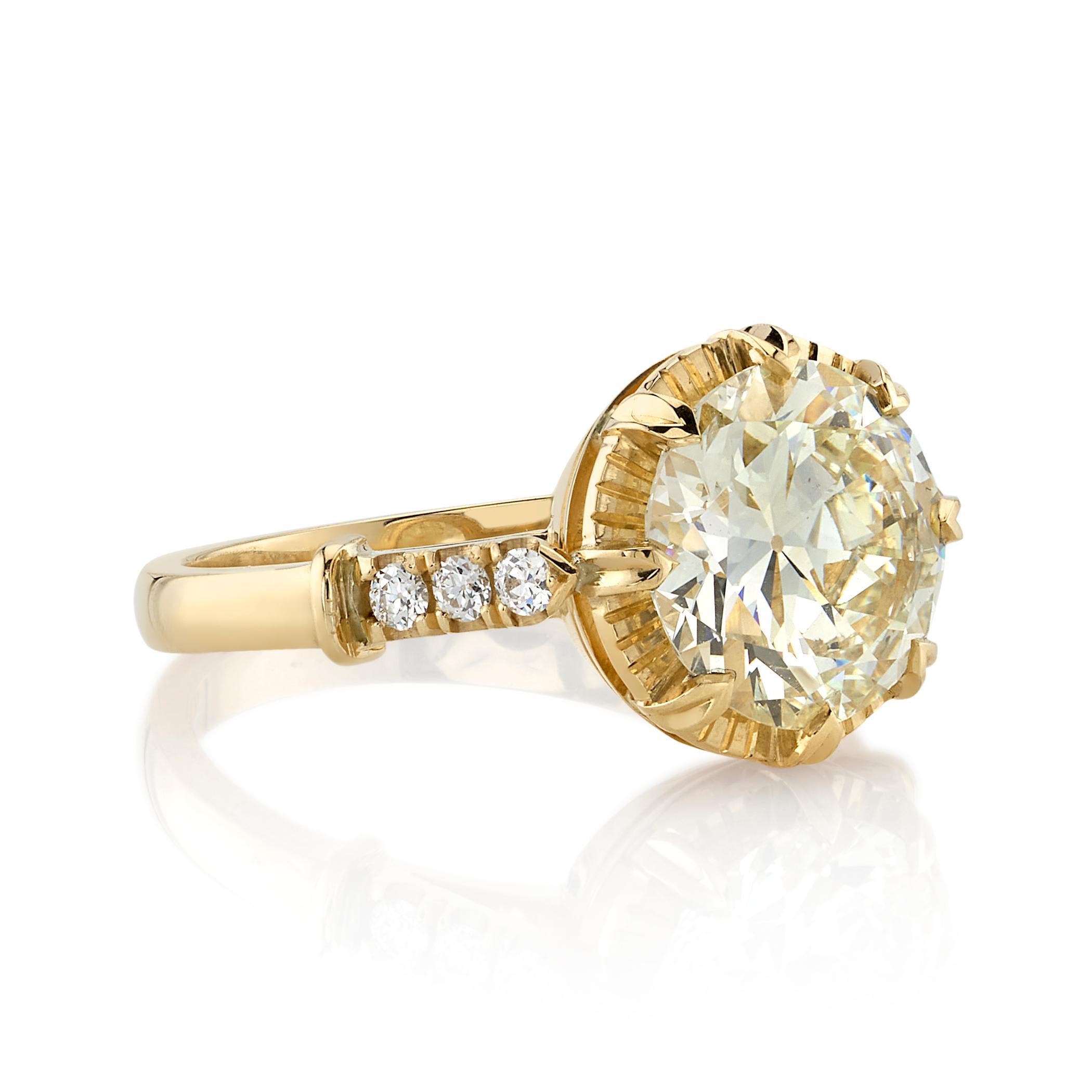 2.69ct N-SI1 GIA certified old European cut diamond with 0.12ctw old European cut accent diamonds set in a handcrafted 18K yellow gold mounting.

Ring is currently a size 6 and can be sized to fit. 

Our jewelry is made locally in Los Angeles and