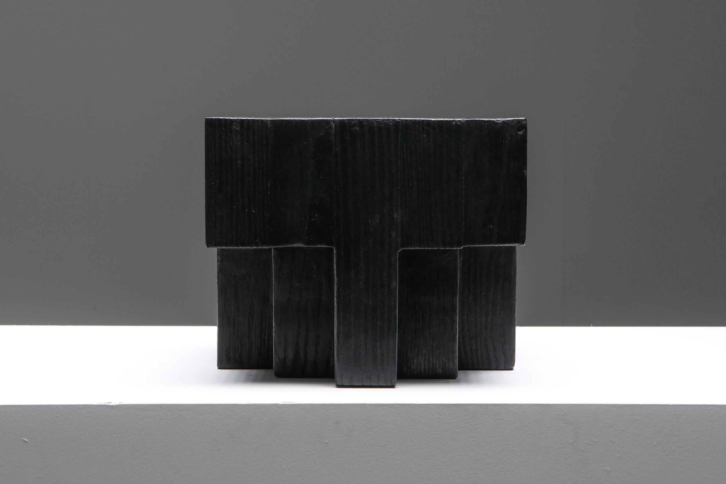 Arno Declercq; Belgian Design; Handcrafted

Made in burned and waxed Iroko wood and burned steel.
small 13 cm wide x 13 cm deep x 14 cm high / 5” wide x 5” deep x 15,5” high
Large 21 cm wide x 21 cm deep x 18 cm high / 8,2” wide x 8,2” deep x 7”