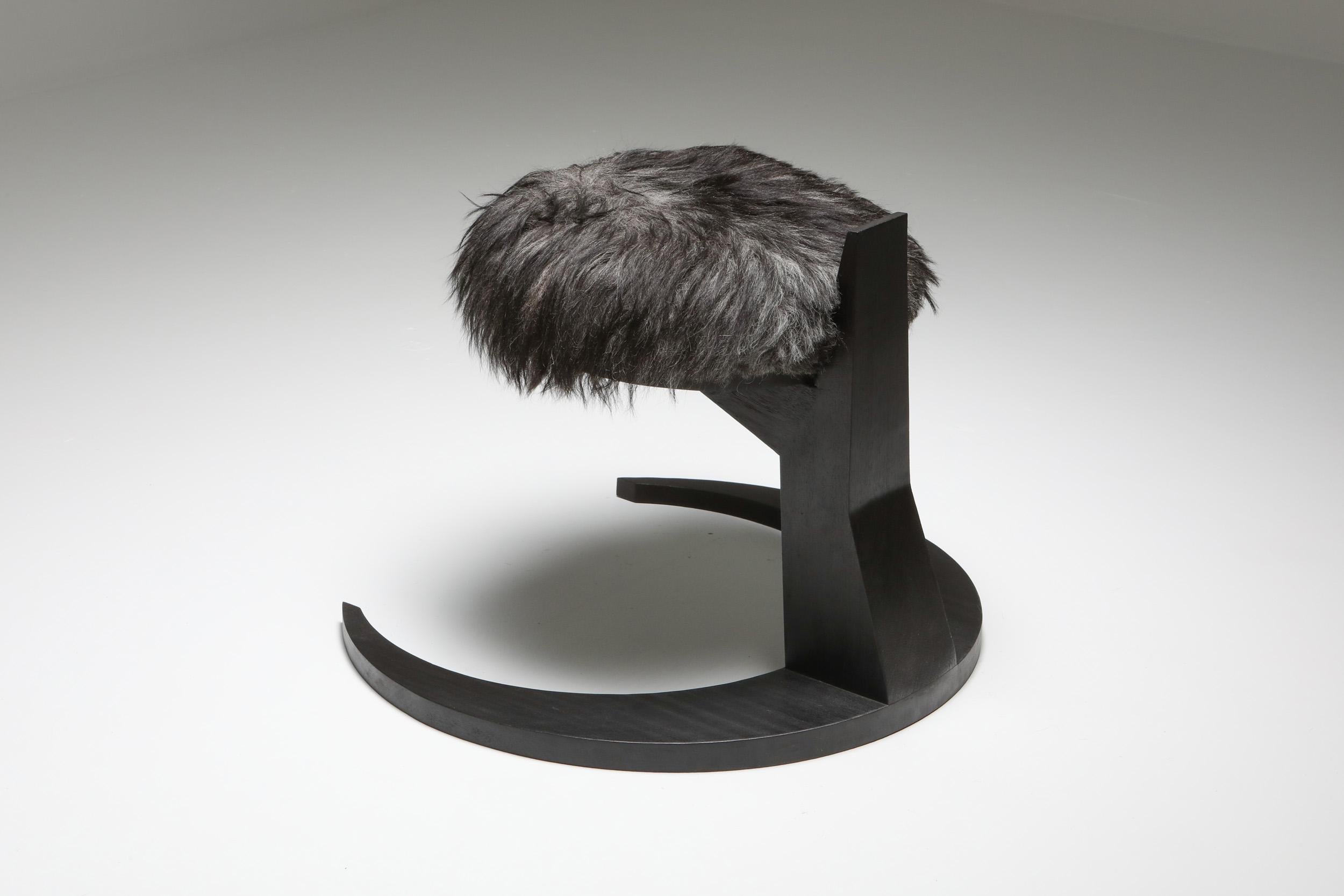 Arno Declercq; Burned and waxed Iroko wood; Belgian Design; Collectible design; Handcrafted

Burned and waxed Iroko wood finished with a sheep wool fixed seat. 

Other finishes and colors possible. 

Measures: 80 cm wide x 71 cm long x 60 cm high /