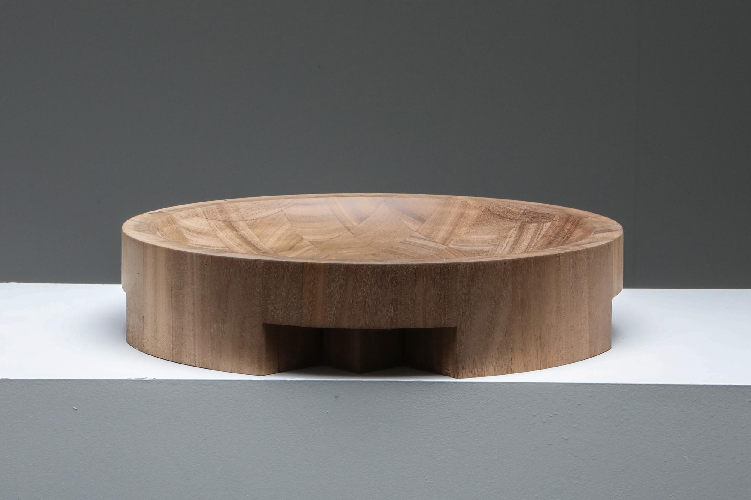 Arno Declercq, Belgian design, handcrafted

Made in African walnut, sanded and finished with varnish
43 cm wide x 43 cm long x 9 cm high / 17” wide x 17” long x 3.5” high

Belgian designer and art dealer, born in 1994, who makes bespoke objects