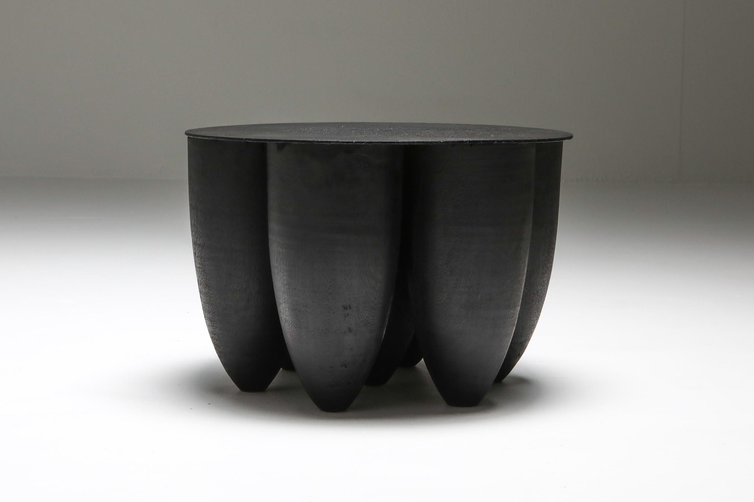 Arno Declercq; Belgian Design; Handcrafted

Made in burned and waxed Iroko wood and burned steel.
45 cm wide x 45 cm deep x 30 cm high / 17.7” wide x 17.7” deep x 12” high

Belgian designer and art dealer, born in 1994, who makes bespoke