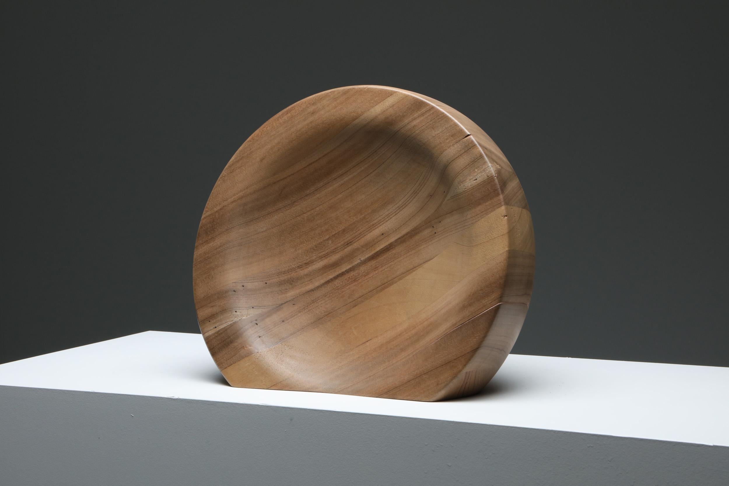 Arno Declercq; Belgian design; handcrafted

Made in African walnut, sanded and finished with varnish
43 cm wide x 43 cm long x 15 cm high / 17” wide x 17” long x 6” high

Belgian designer and art dealer, born in 1994, who makes bespoke objects