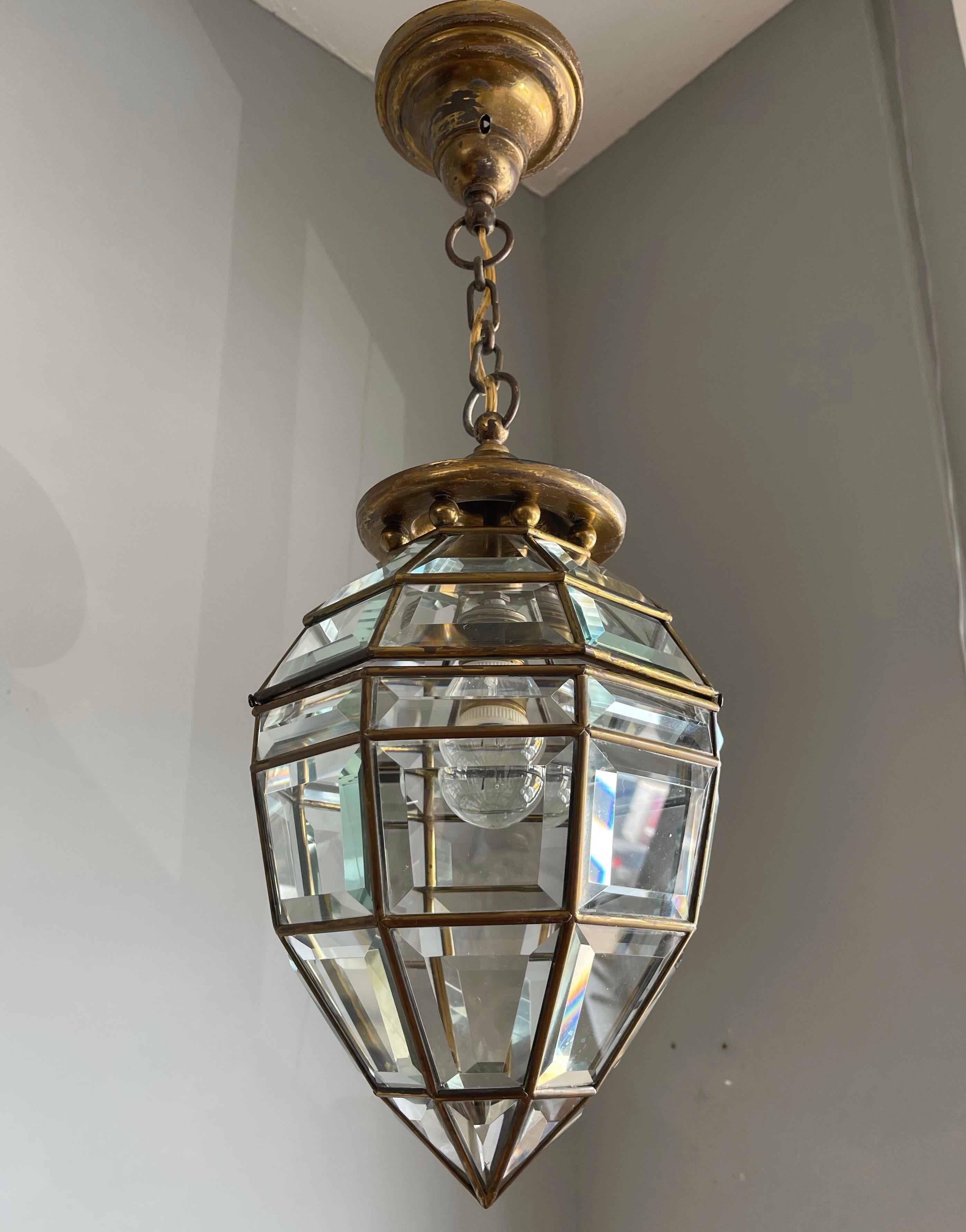 Wonderful ceiling lamp for the perfect ambiance.

If you are looking for a rare, beautiful and geometric design Art Deco pendant then this unique specimen from the 1920s could be the one for you. This diamond shape pendant has several stunning