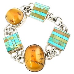 Bracelet à maillons en ambre et turquoise incrusté, fabriqué à la main et signé par un artisan