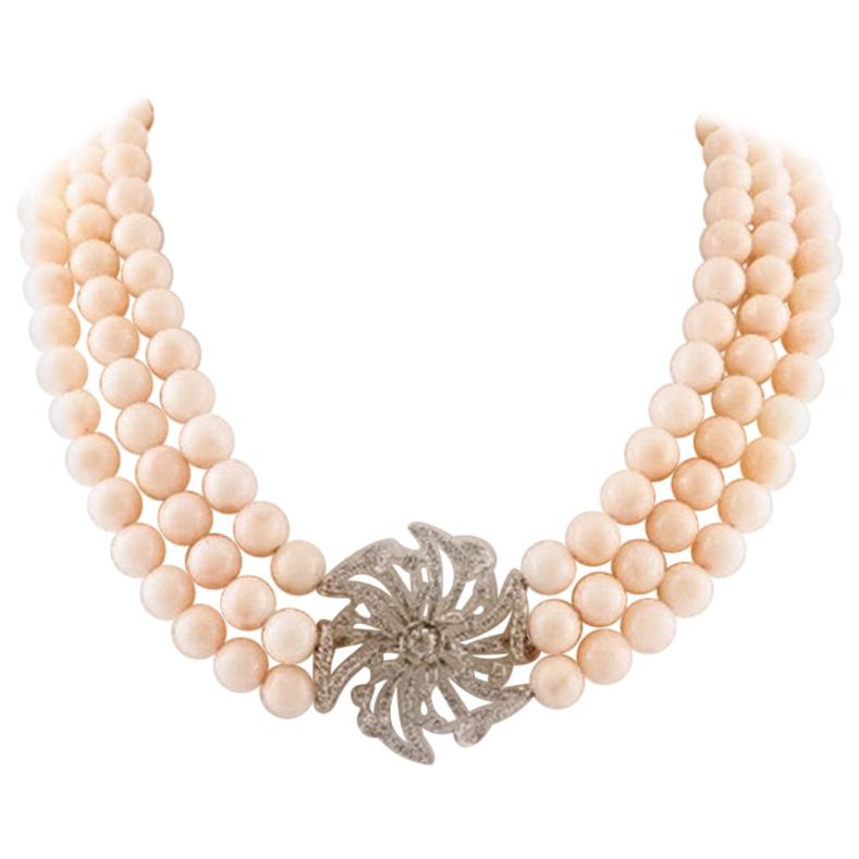 Handcrafted Beaded Coral Necklace with 18 Karat Gold and Diamonds Central Flower For Sale