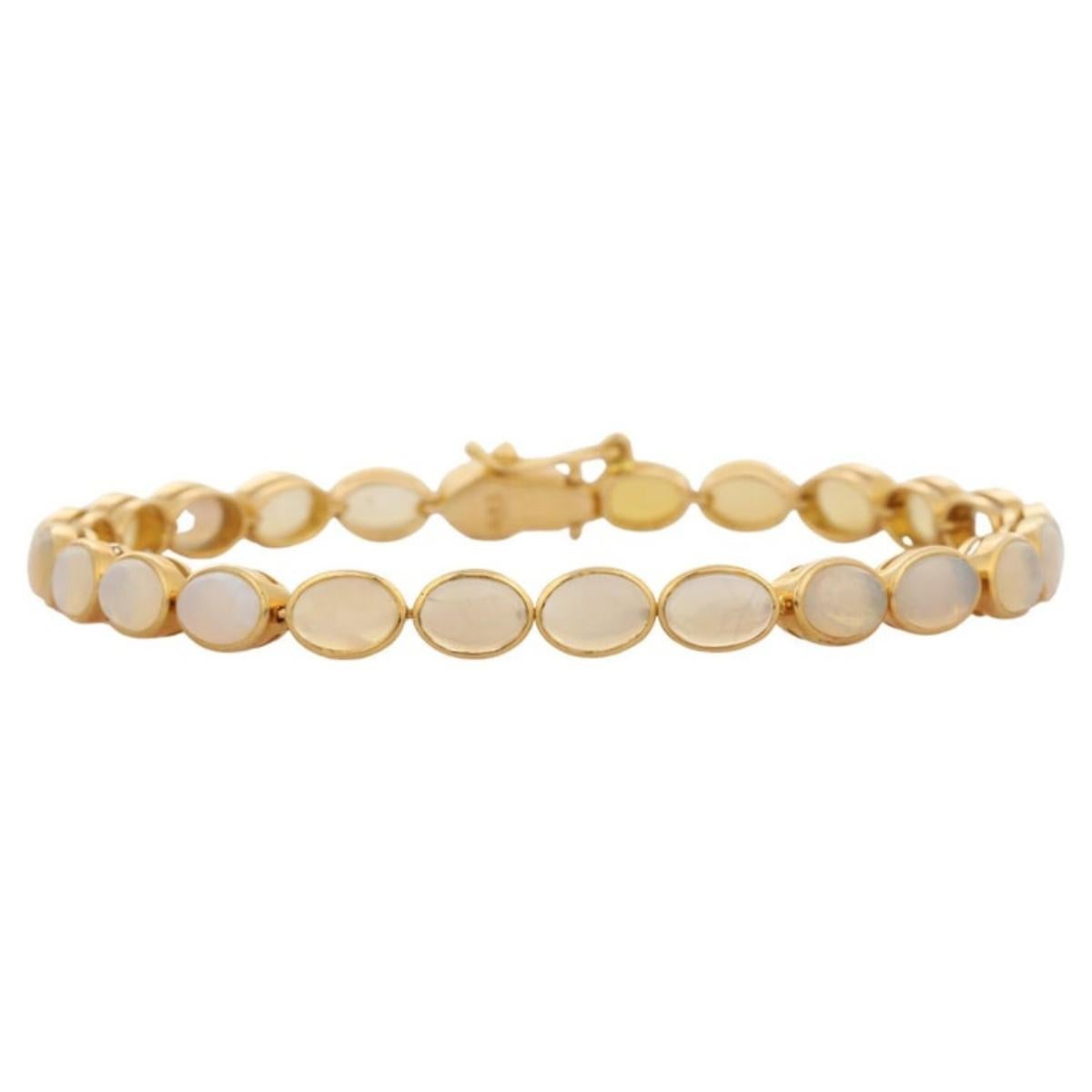 Modern Handcrafted Bezel Set Oval Opal Tennis Bracelet in 18k Yellow Gold for Women For Sale