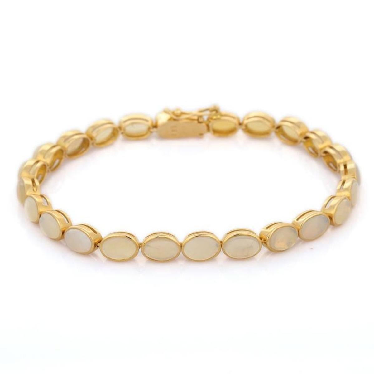 Handcrafted Bezel Set Oval Opal Tennis Bracelet in 18k Yellow Gold for Women For Sale 2
