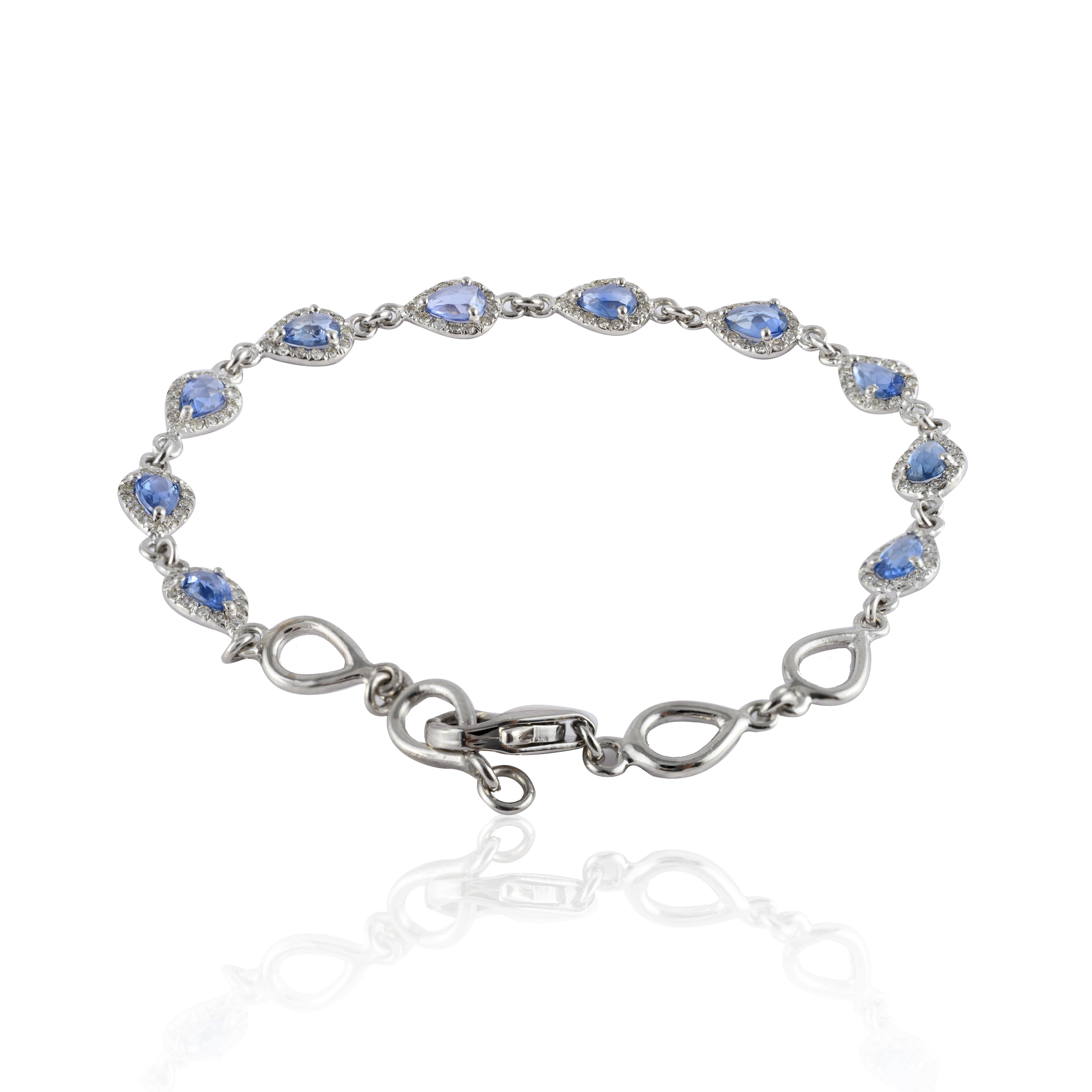 Art Nouveau Handcrafted Blue Sapphire and Halo Diamond Chain Bracelet in 14k White Gold For Sale
