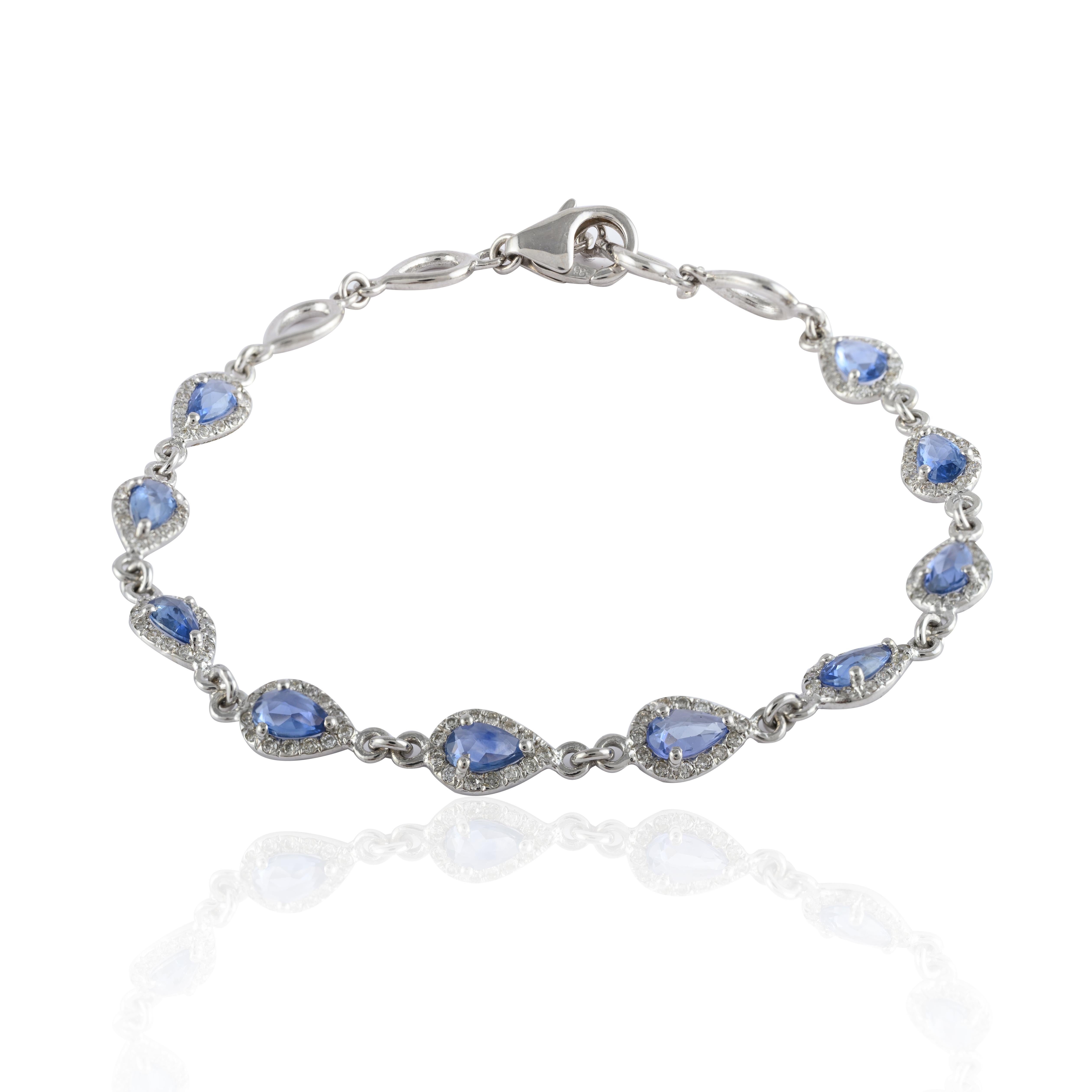 Pear Cut Handcrafted Blue Sapphire and Halo Diamond Chain Bracelet in 14k White Gold For Sale
