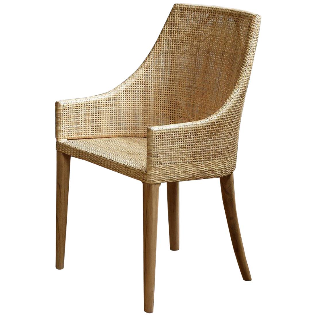 Elegant rattan armchair with a structure in natural teak and a braided rattan seating shell, combining quality, robustness and class. Perfect on your terrace, in your veranda, your winter garden, around the dining table and even in your office! In