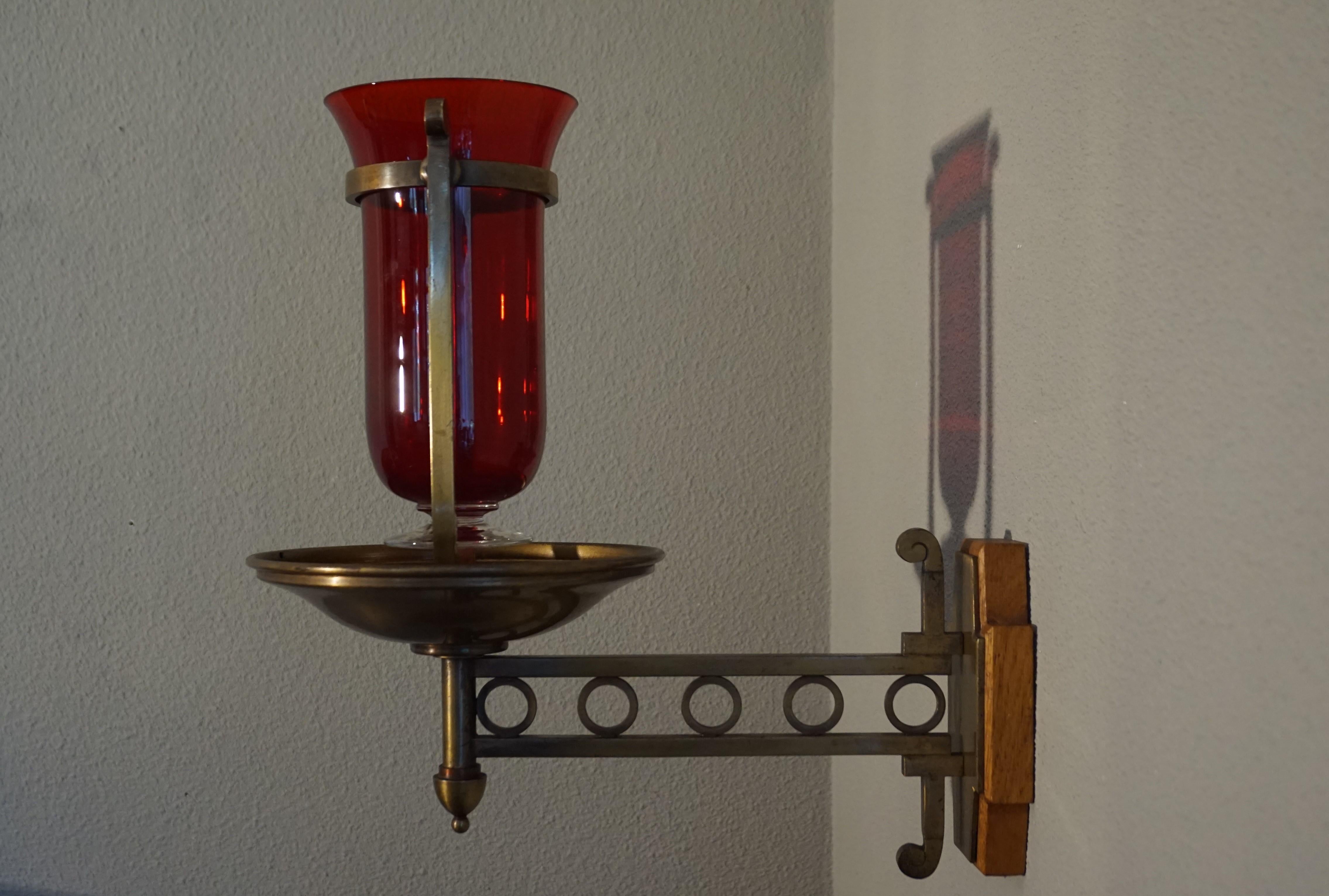 Dutch Handcrafted Brass with Cranberry Glass Vessel Art Deco Sanctuary Wall Lamp, 1920