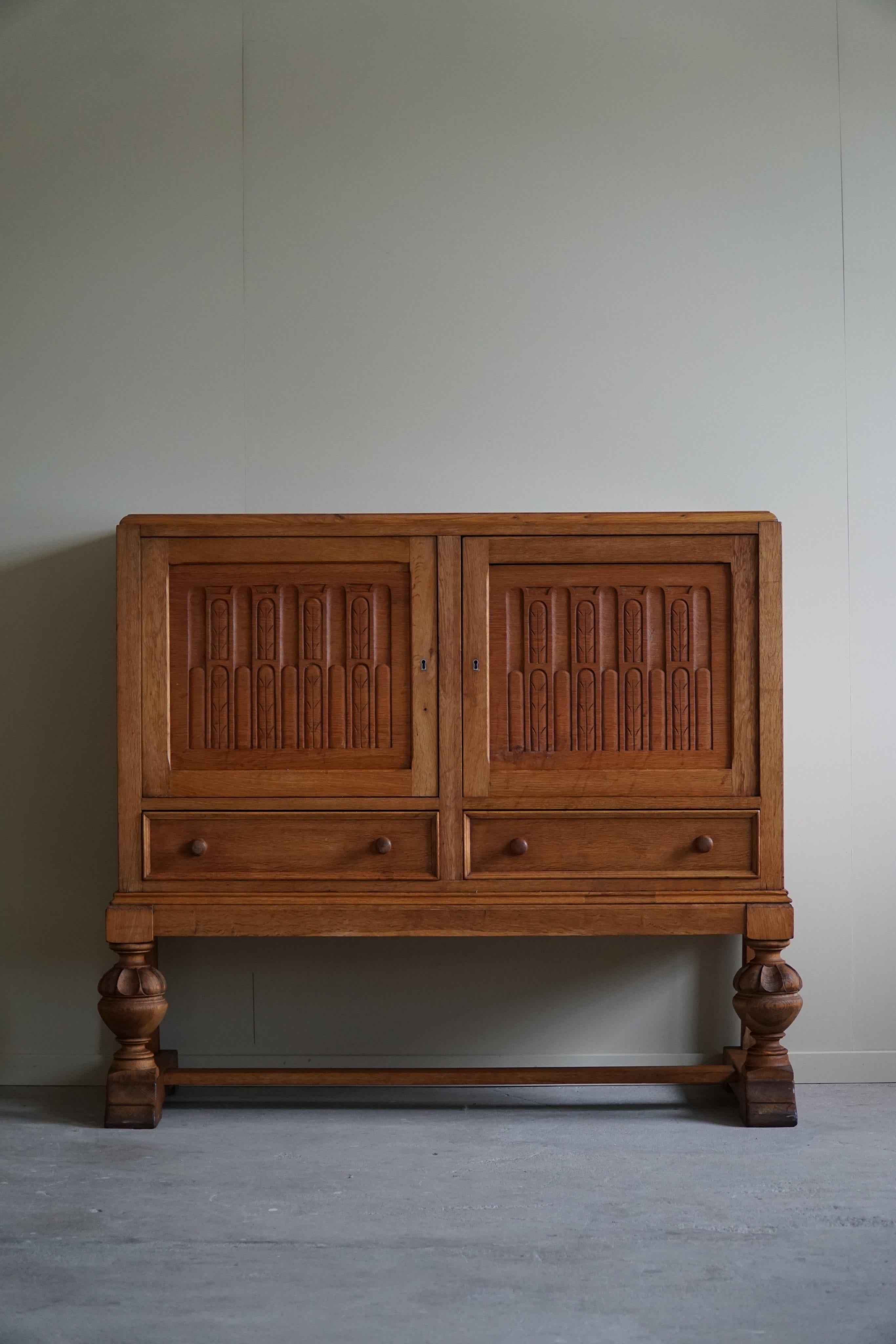 This exquisite handcrafted cabinet was born from the skilled hands of a Danish carpenter during the mid-20th century, precisely in the 1950s. Crafted with meticulous attention to detail and a deep appreciation for the beauty of natural materials,