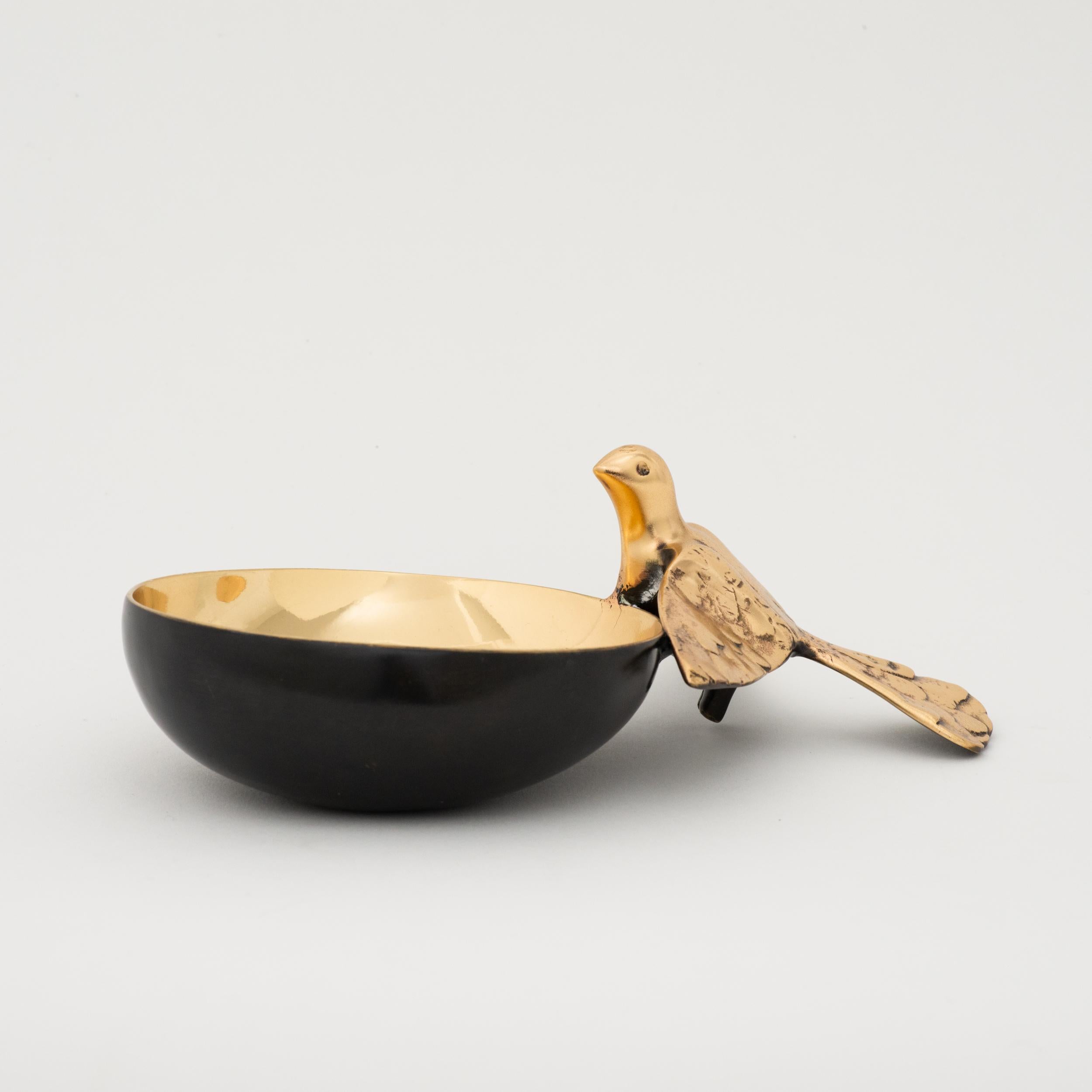 Sumptuous decorative bowl with bird.

Unique design and beautiful finish. The piece is entirely handcrafted with great skills and talent. Cast using very traditional techniques, the bird and inside of the bowls are polished revealing the lustrous