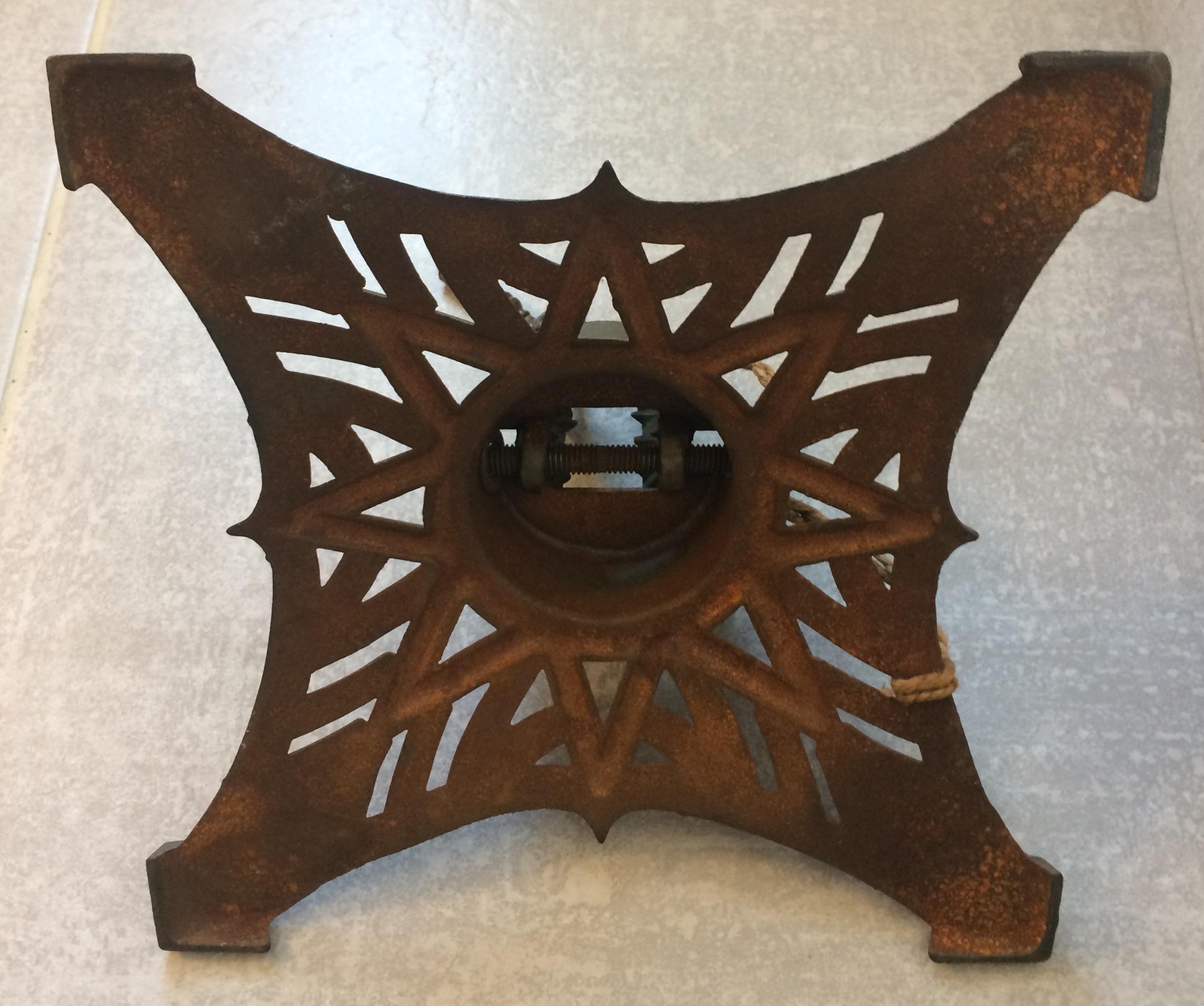 A fine French Art Deco Christmas tree stand. 
This early 20th century, cast iron stand is especially crafted for small Christmas trees. It is perfectly Art Deco in shape and style. Ideal for displaying a Christmas tree in a shop window, on a table