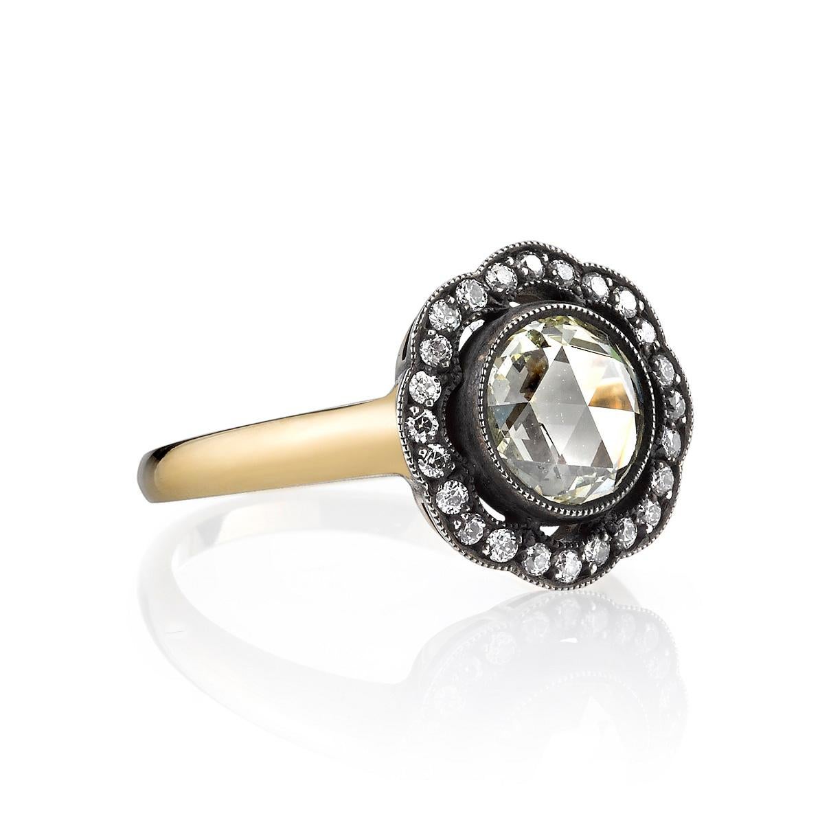 1.17ct M/VS rose cut diamond with 0.22ctw old European cut accent diamonds set in a handcrafted 18K yellow gold and oxidized silver mounting.

