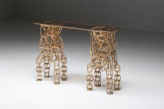 Mesa consola artesanal de hierro dorado, años 70