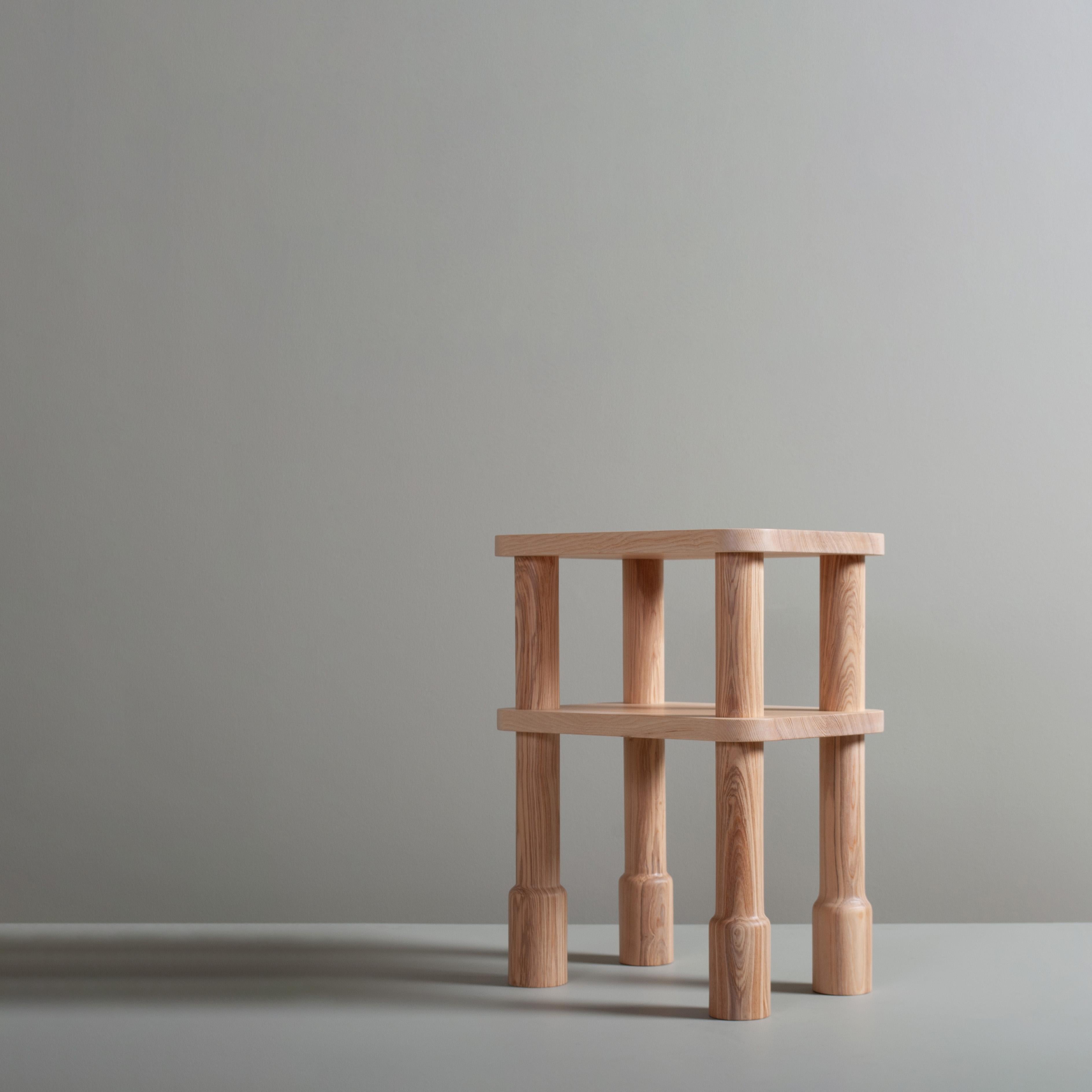 A hand-crafted and turned English ash end table. 
These are robust bespoke pieces of fine quality, handmade by our master craftsman in solid English ash. Finished in durable Osmo oil. 
Inspired by Maunsell forts and old cannon ramrods. These pieces