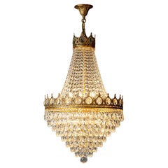 Lustre artisanal en laiton massif avec finition dorée