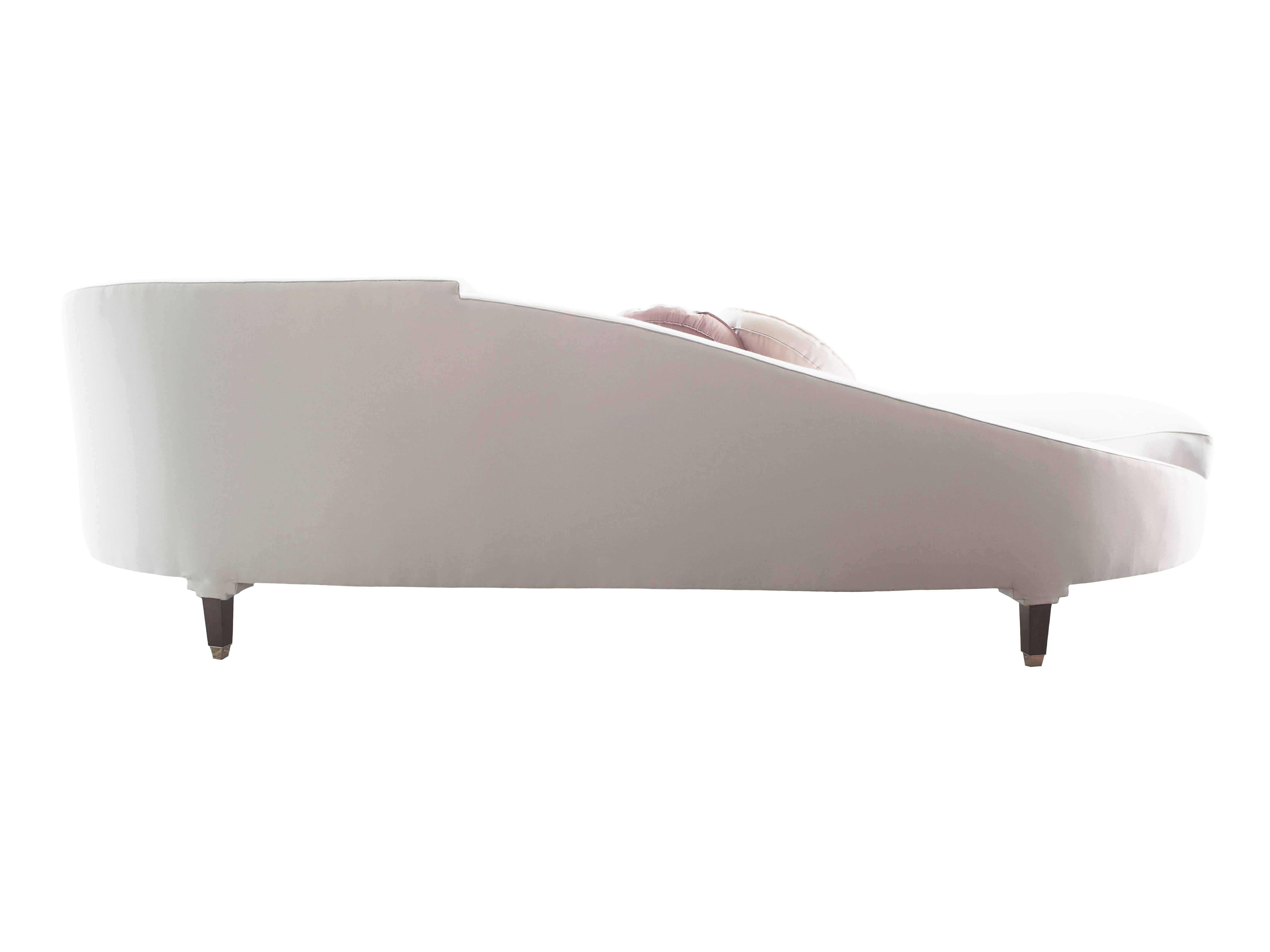 Lisa Tharp Collection  Fibonacci Chaise 

Couture curves are inspired by Italian mathematician Leonardo Fibonacci's famed number sequence, which defines spirals found throughout nature.

Walnut frame
Polished nickel sabot ferrules
Right or left