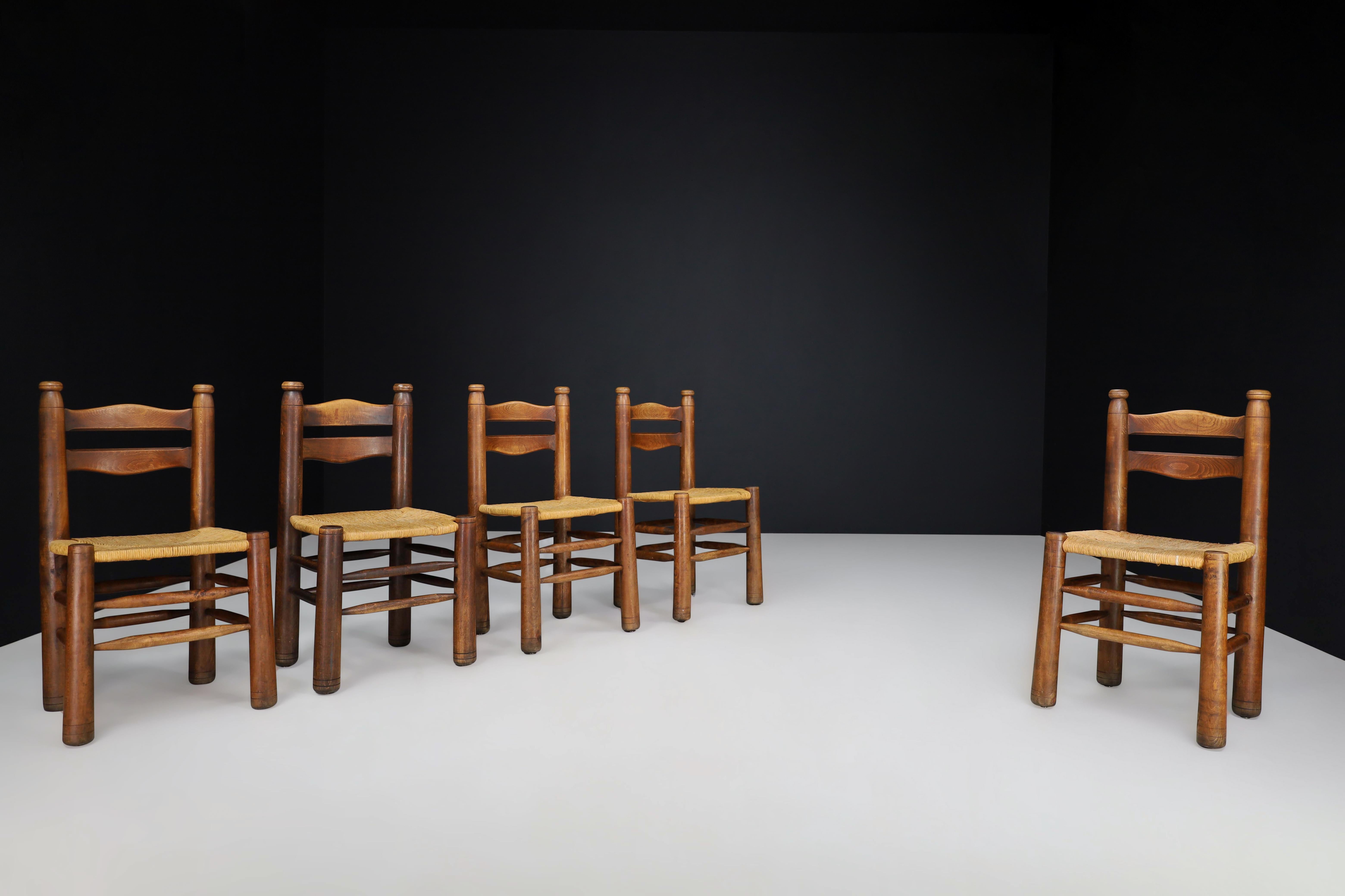 Mid-20th Century Handcrafted Dining Room Chairs in Wood and Rush France 1940s Set of 8