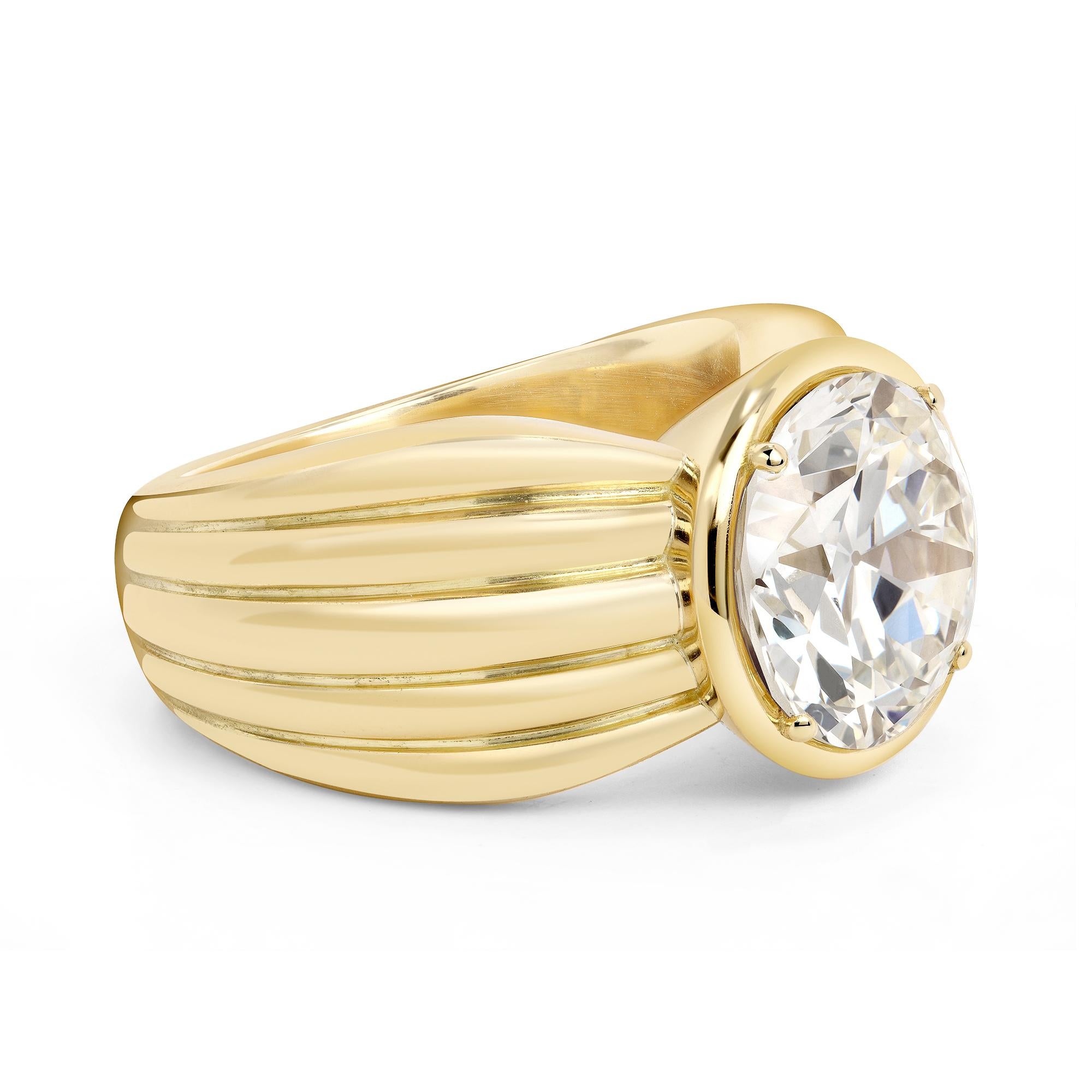 4.74ct N/VS2 GIA certified old European cut diamond prong set in a handcrafted 18K yellow gold mounting.